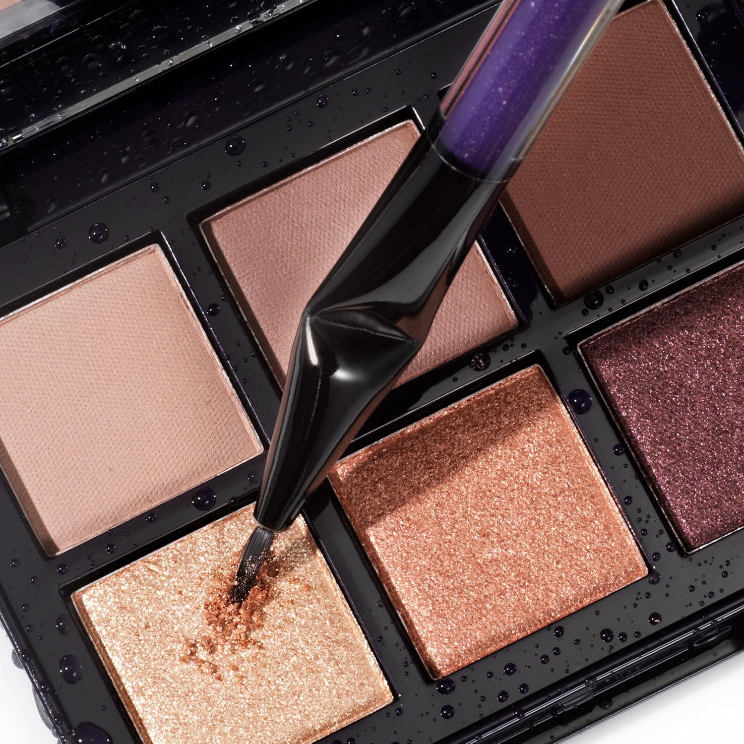 Kevyn Aucoin Angled Eyeliner Brush: Define like a pro. Allows you to stand closer to the mirror for a more precise application plus with a bent ferrule for seamless application along the lash line.