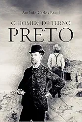 O homem de terno preto
