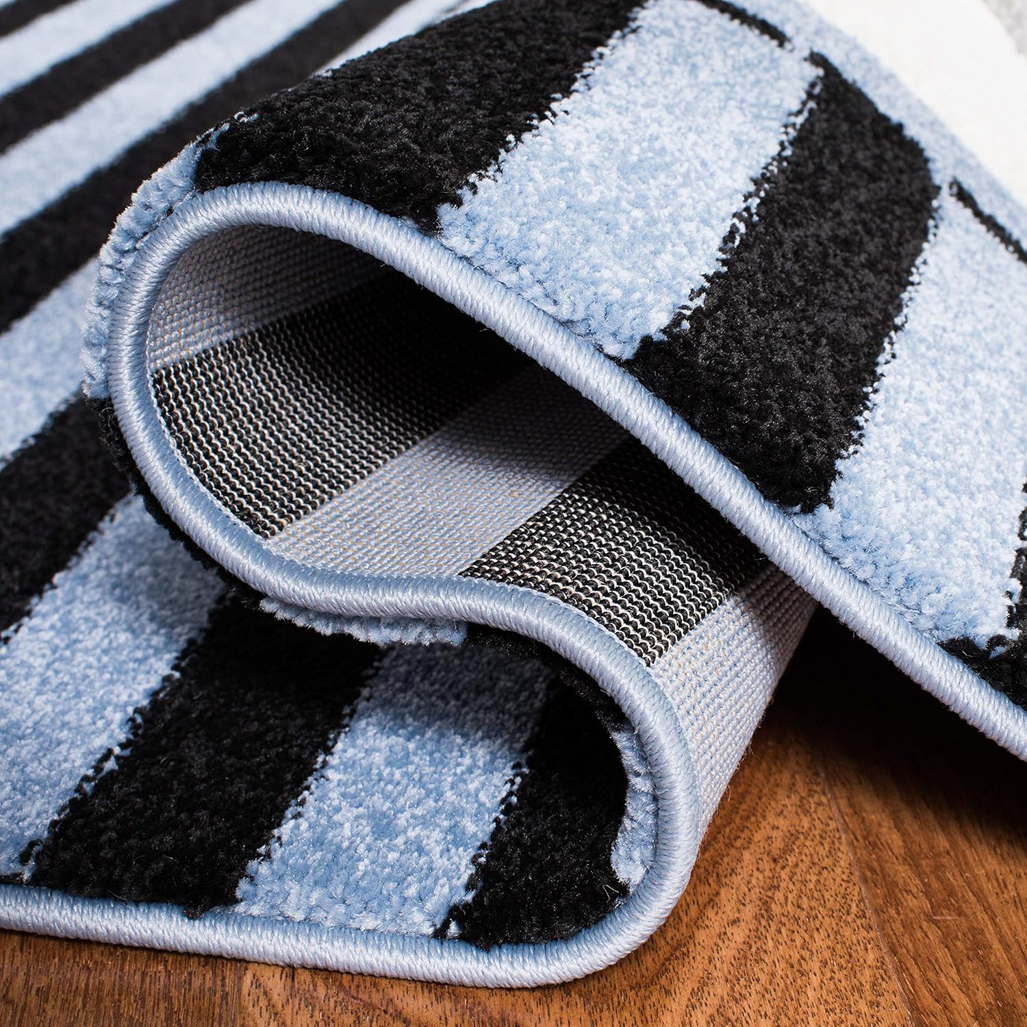 SAFAVIEH Carousel Kids Collection Accent Rug - 2'3" x 4', Navy & Ivory, Stripe Design, Non-Shedding & Easy Care, Ideal for High Traffic Areas for Boys & Girls in Playroom, Nursery, Bedroom (CRK126N)