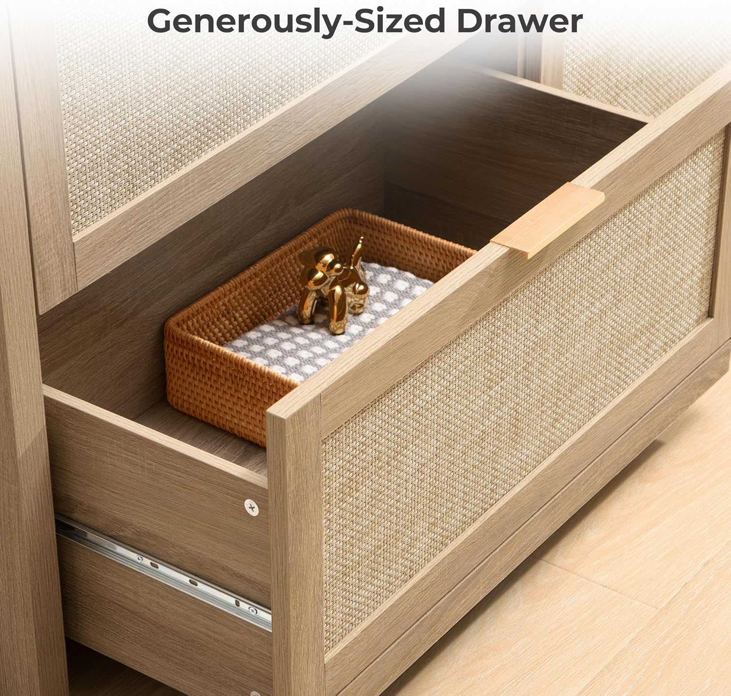 An open drawer of the SICOTAS dresser, revealing its generous depth and storage capacity.