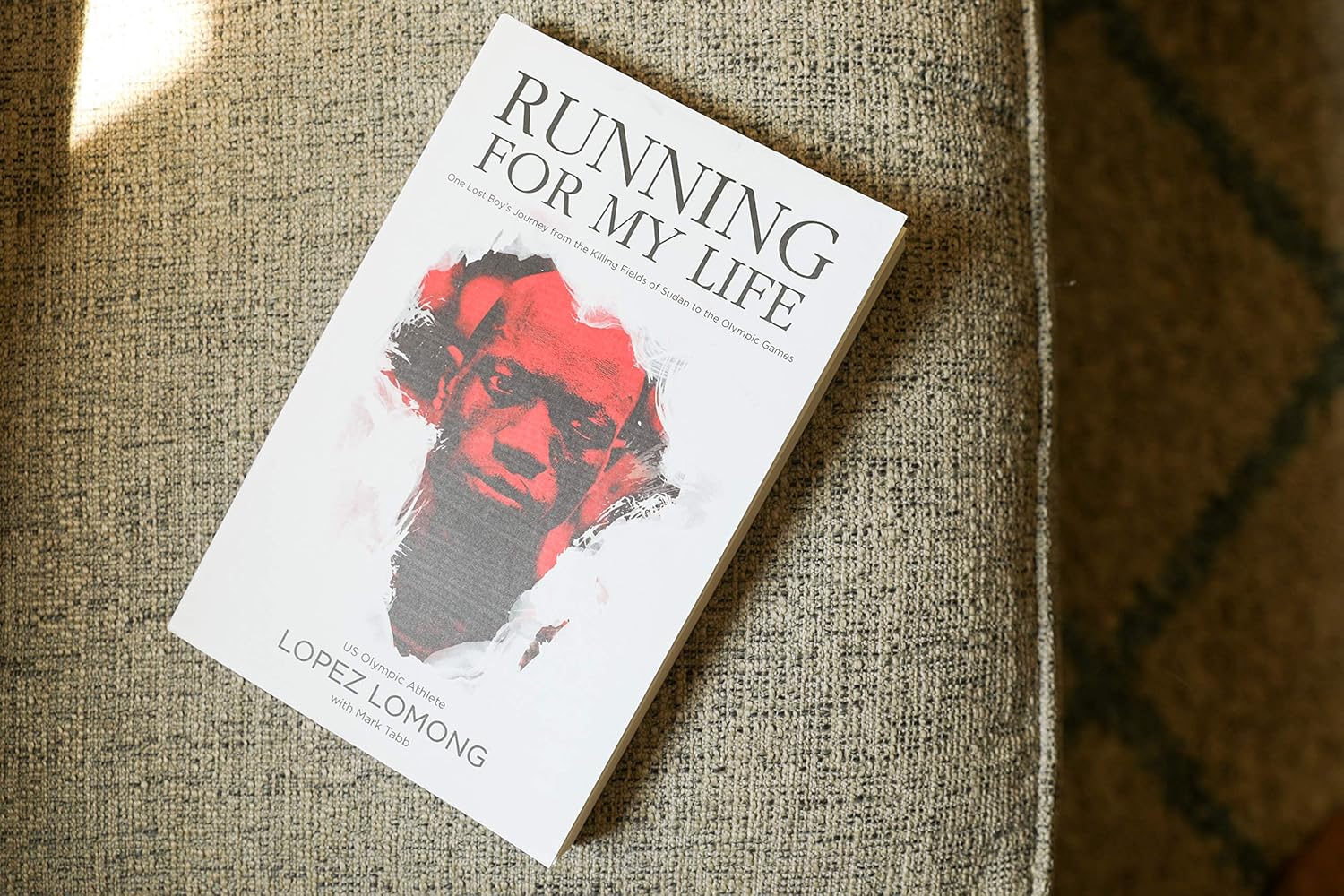 Running for My Life: One Lost Boy's Journey from the Killing Fields of Sudan to the Olympic Games