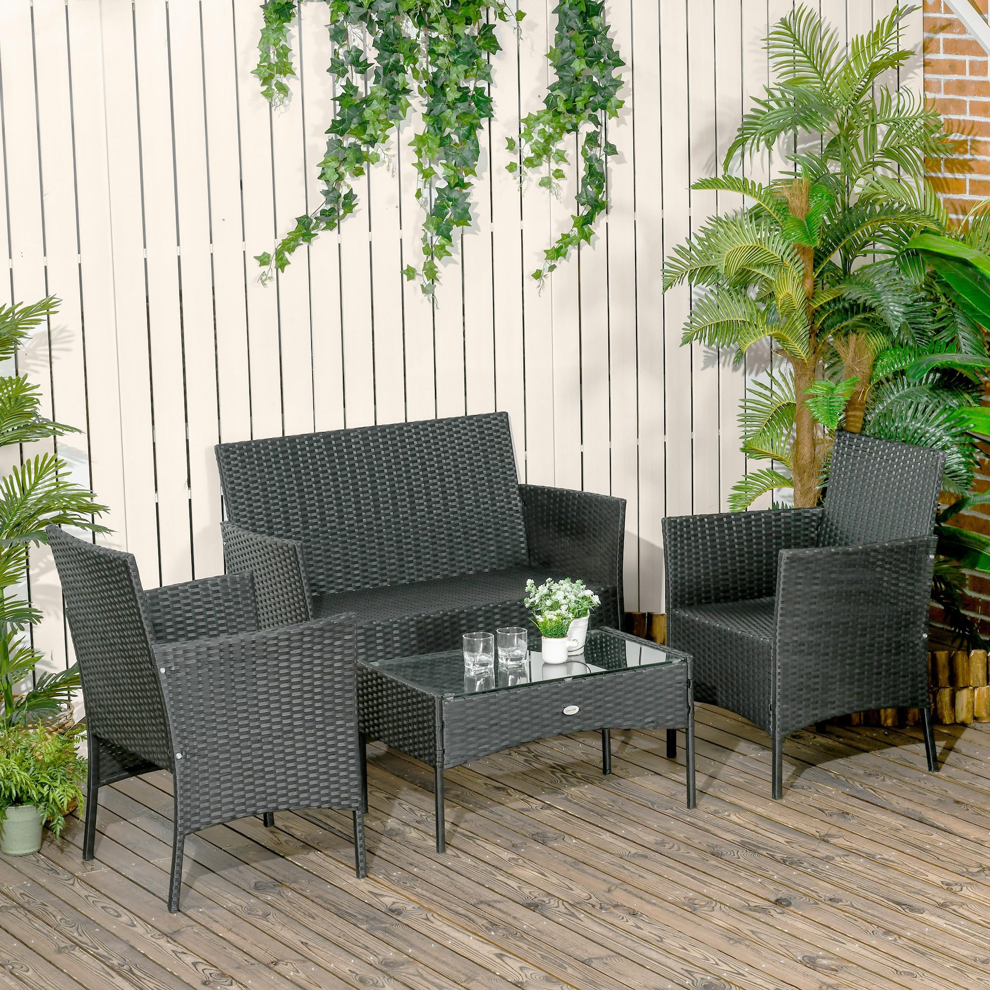 Outsunny Conjunto de Jardín Exterior de Ratán Sintético Juego de 4 Piezas Muebles de Jardín con Sofá de 2 Plazas 2 Sillones 1 Mesa de Centro con Encimera de Vidrio Templado y Cojines Crema y Negro