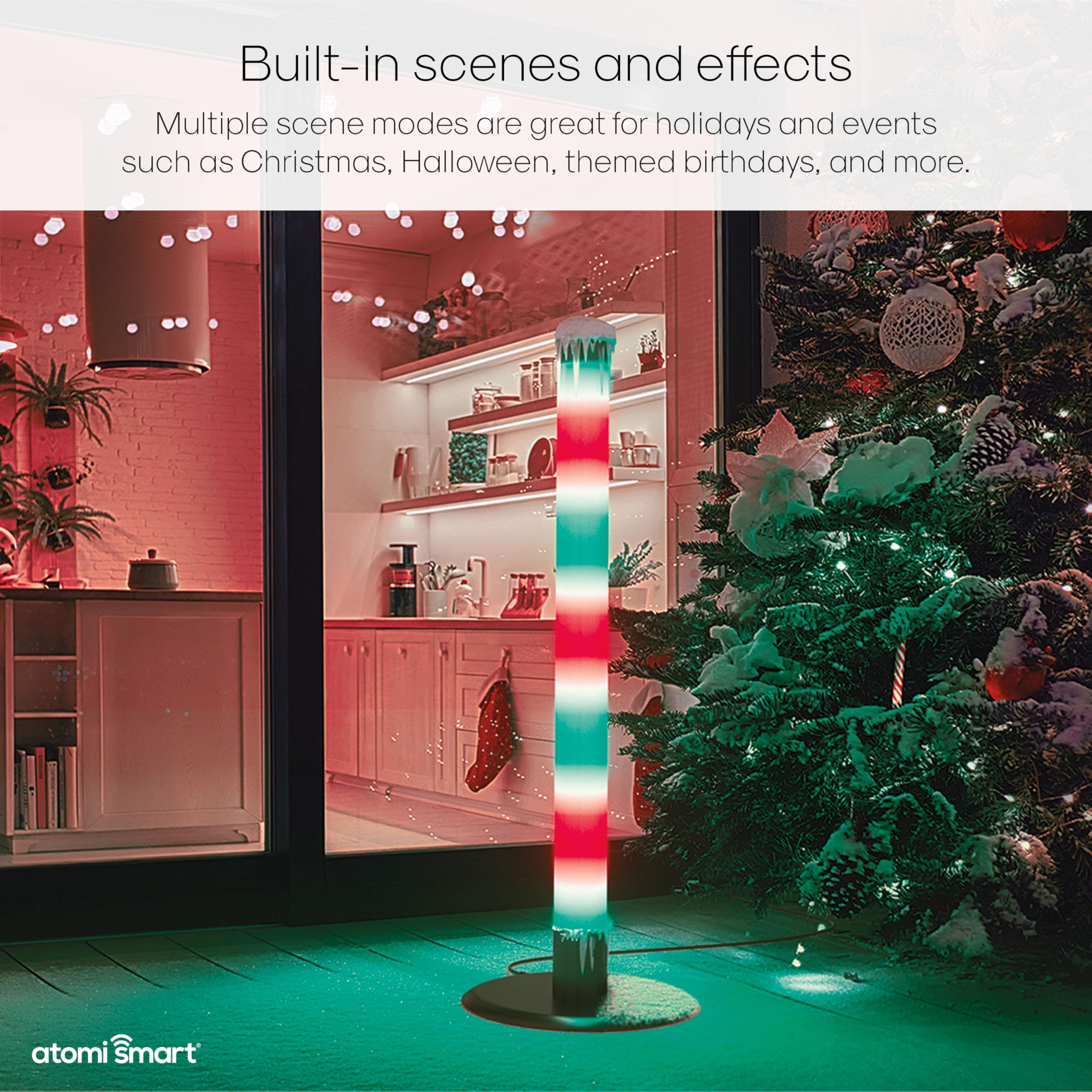 Atomi Smart WiFi LED Outdoor Floor Lamp displaying red and green colors, resembling a candy cane, in an outdoor setting with a Christmas tree.