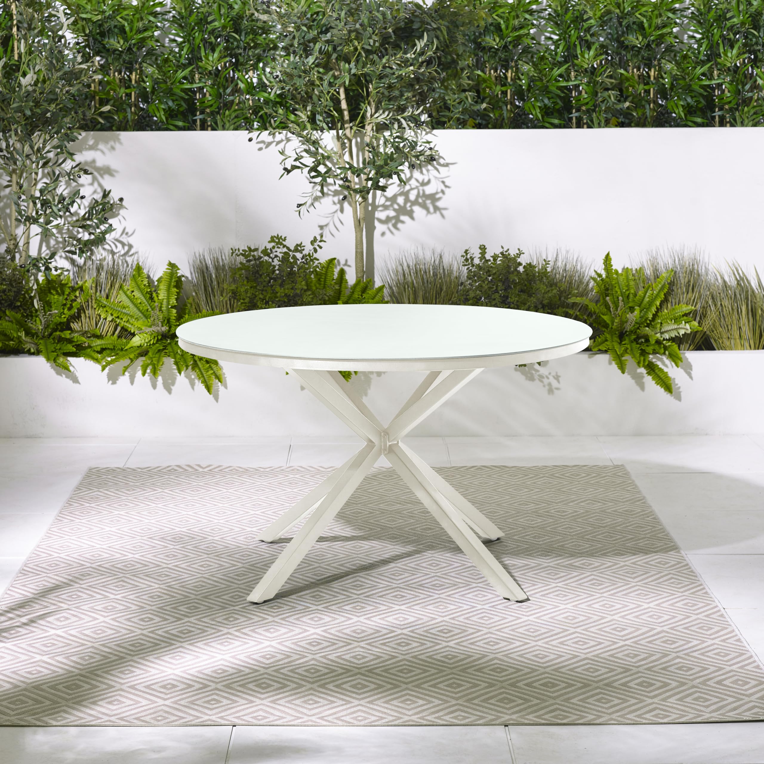 Furniturebox UK Outdoor Furniture, Nanterre Cream Rround Metal Outdoor Dining T, Starburst Legs, Tempered Glass Top, Weather Resistant For Any Garden Patio, Deck or Conservatory