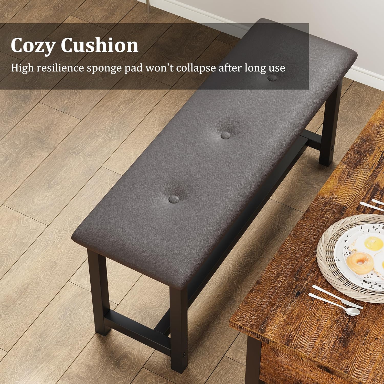 Close-up of the dining table's storage drawer with compartments for utensils