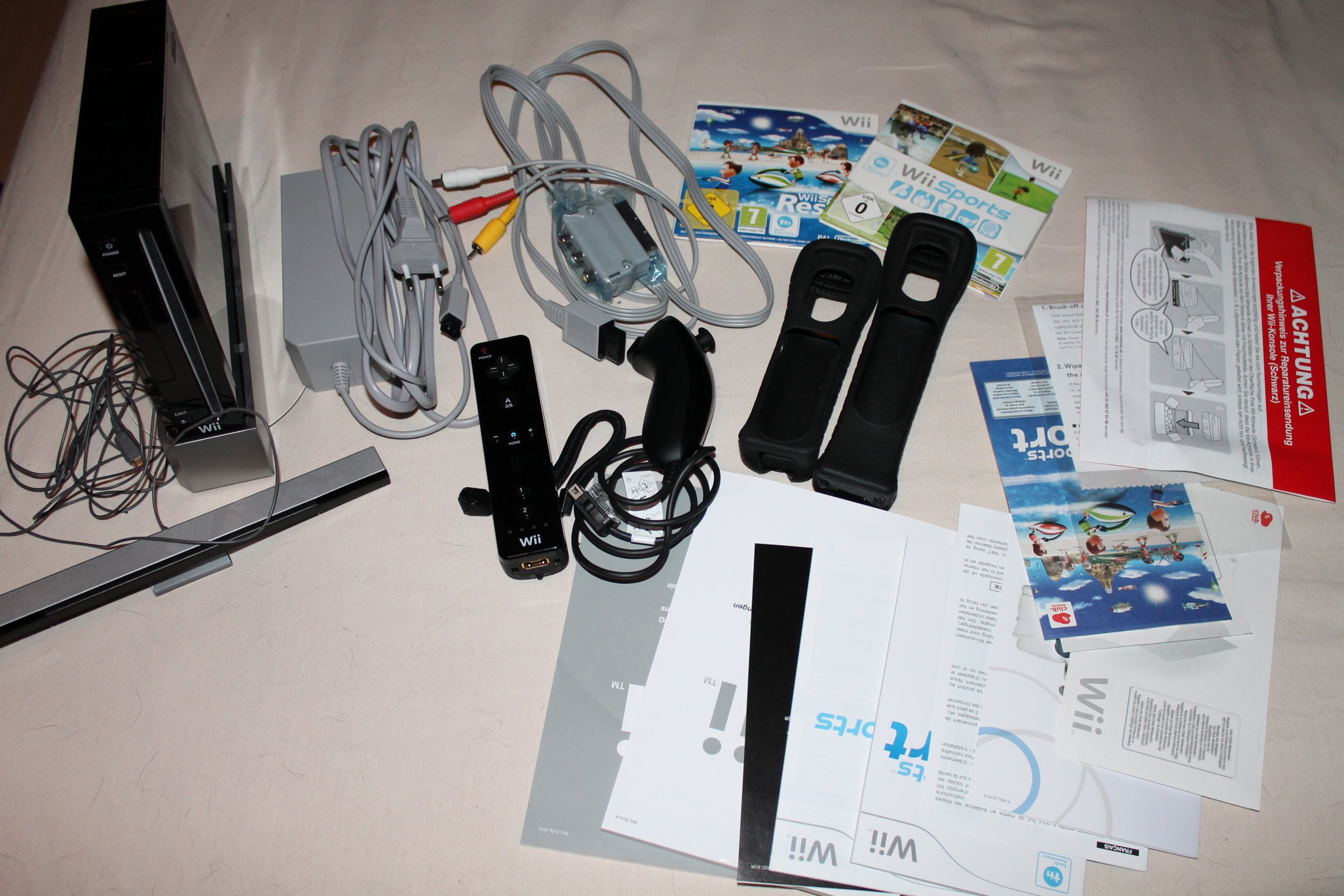 Console Wii noire + accessoires (inclus Wii Sports + Wii Sports Resort)