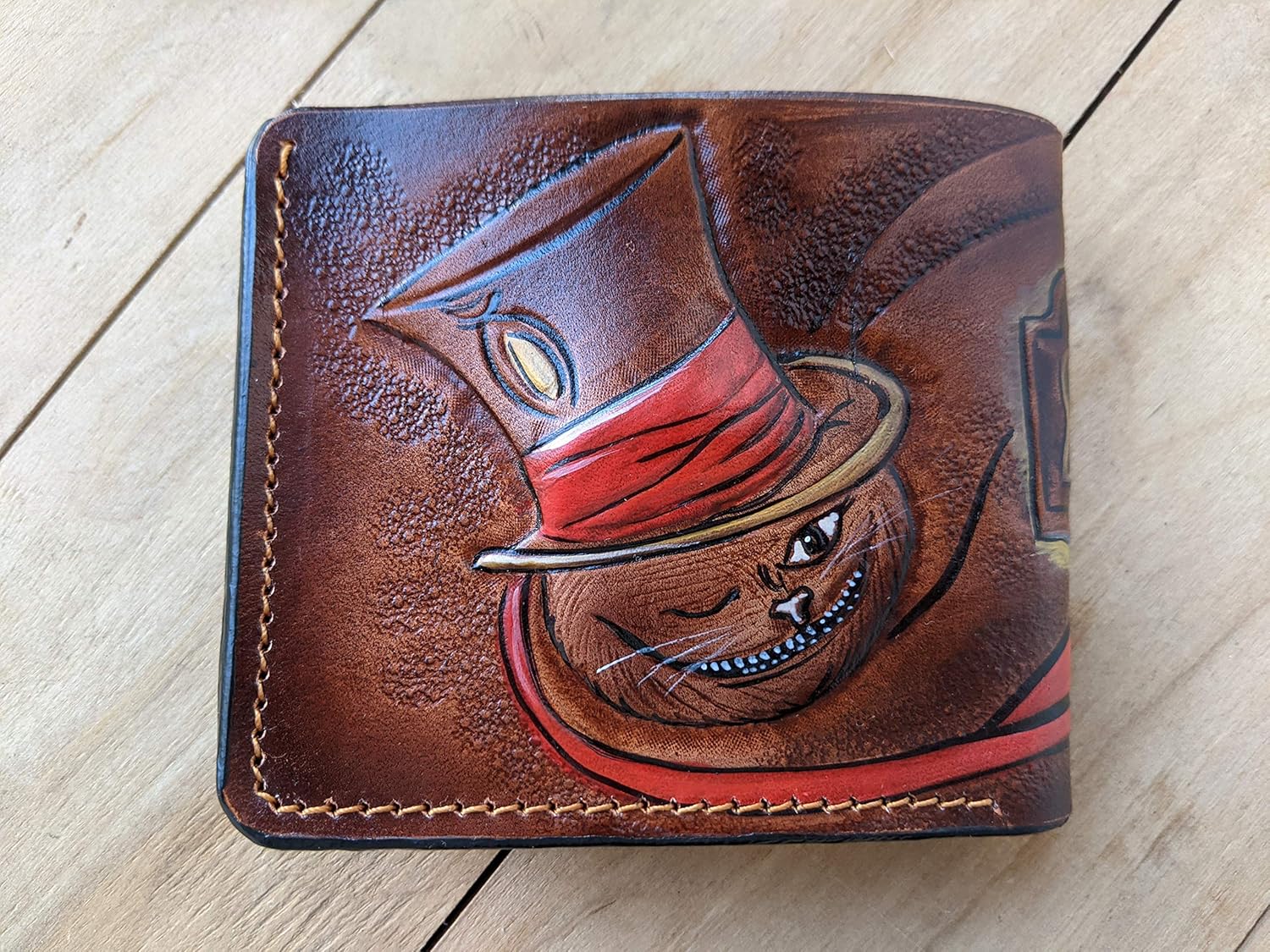 Alice in Wonderland Cheshire Cat Leather Wallet for Men – “We’re All Mad Here” Engraved Design – RFID Genuine Leather Bifold Biker Wallet, Embossed, Carved & Tooled Wallet, Custom Personalized Gift