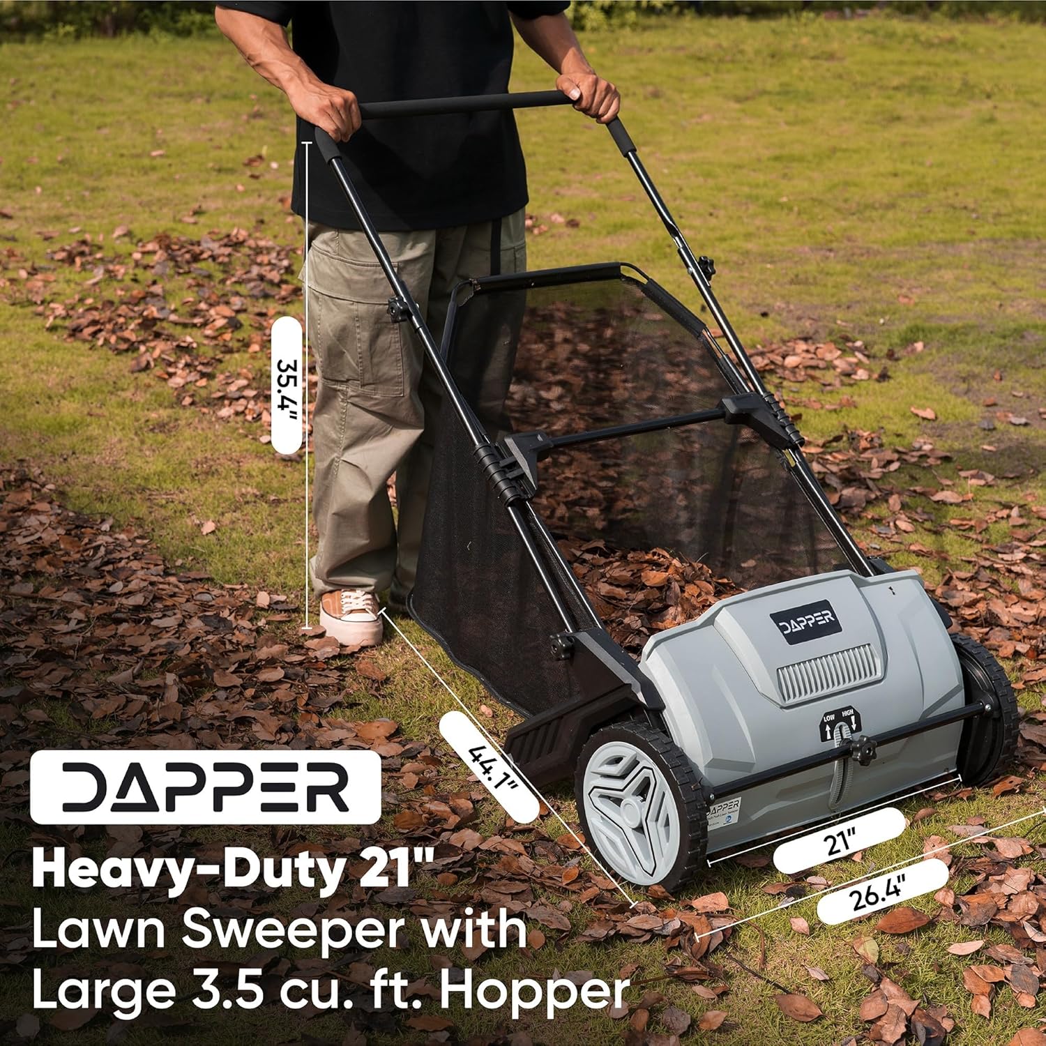 User pushing lawn sweeper with dimensions