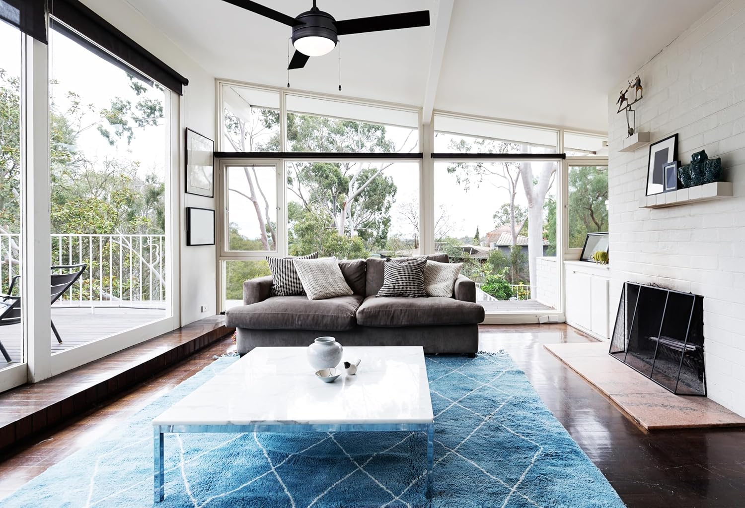 Canarm Calibre III 48-inch Ceiling Fan installed in a modern living room with large windows