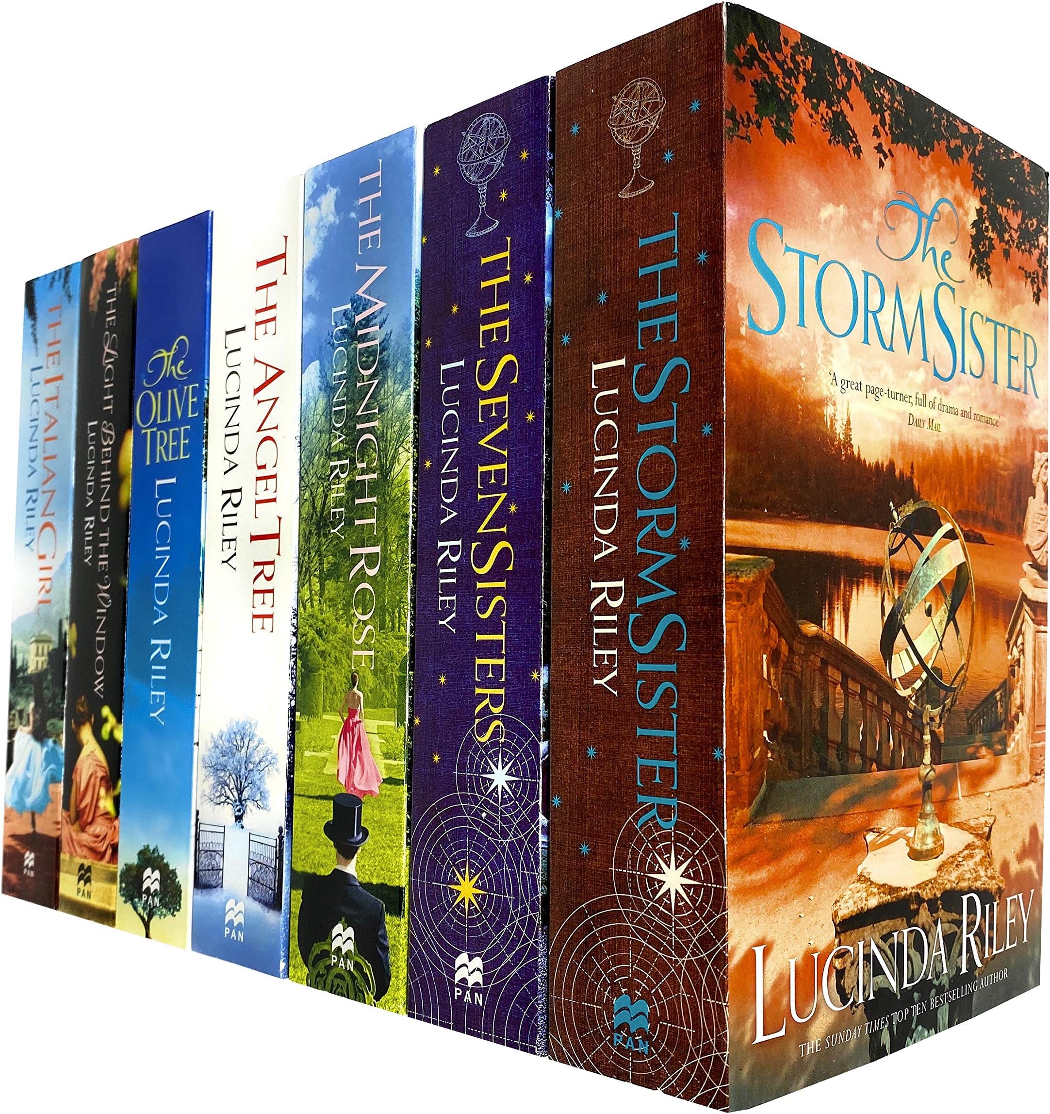 Lucinda Riley The Seven Sisters Series 7 Books Collection Set (Seven Sisters, Storm Sister, Midnight Rose, Angel Tree, Olive Tree, Italian Girl, Light Behind The Window) Paperback