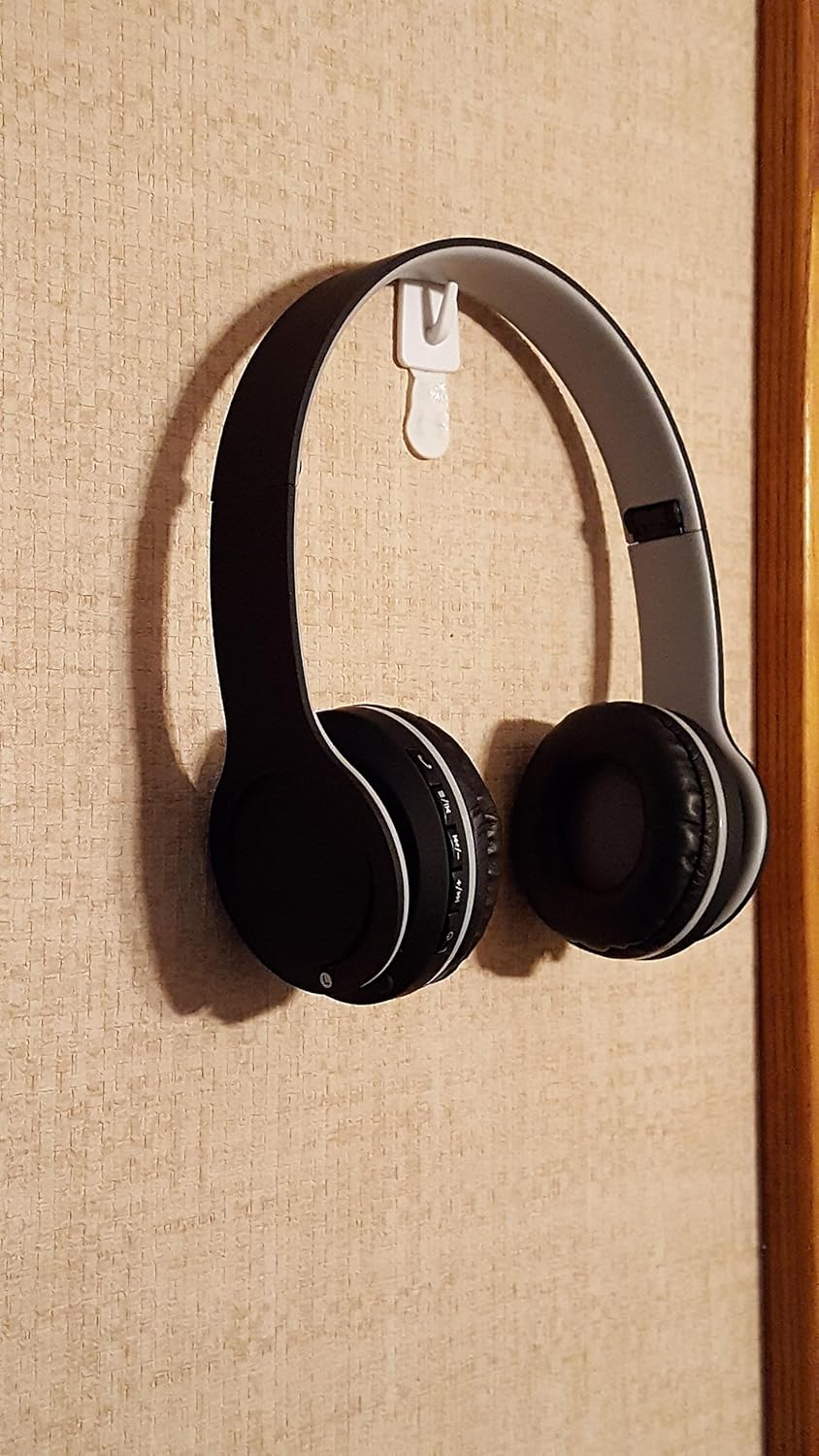 Strona view of Sentry BT200S headphones showing control buttons
