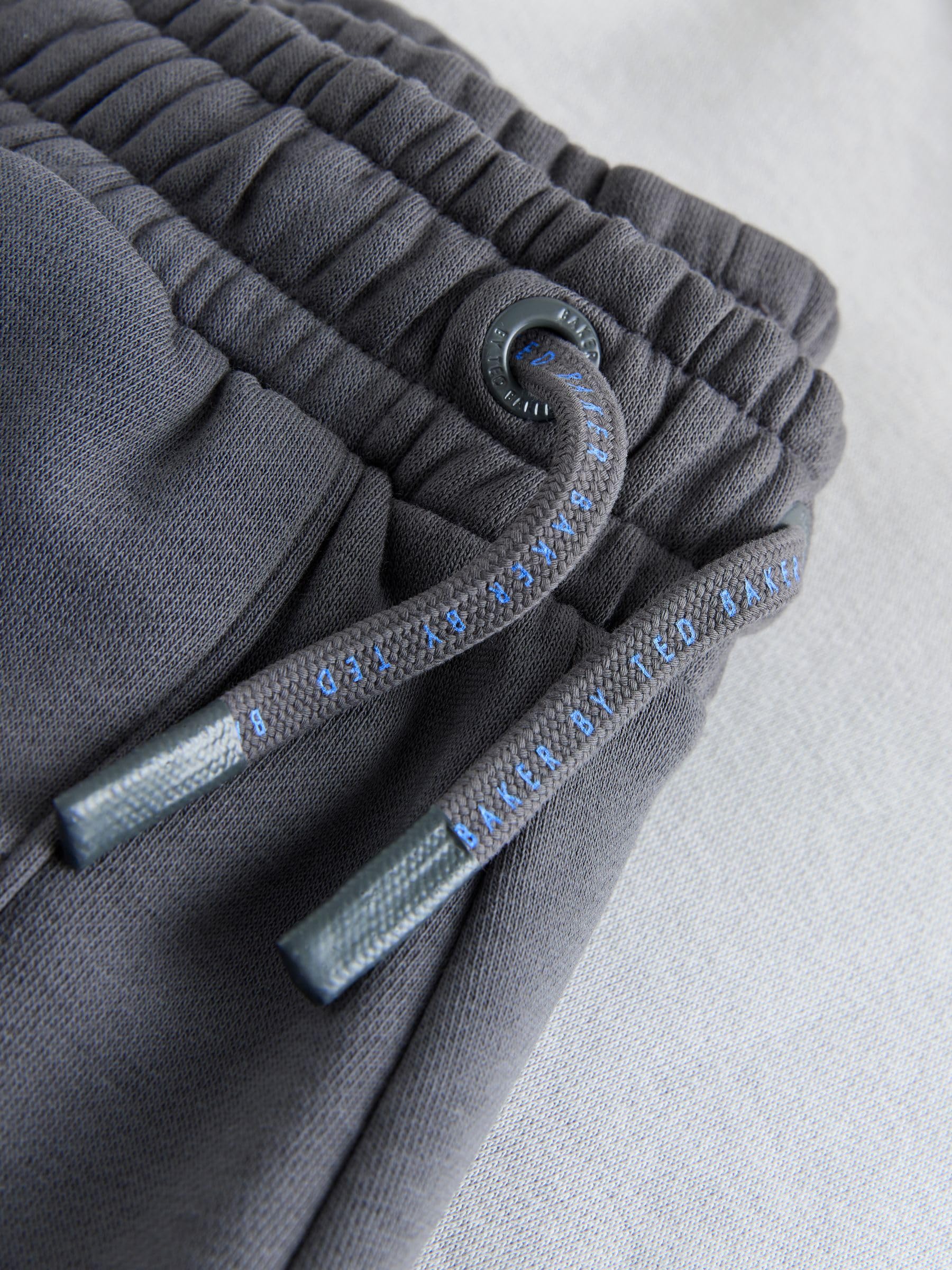 Niños Conjunto de sudadera extragrande con capucha y pantalones de chándal con bolsillo y cremallera