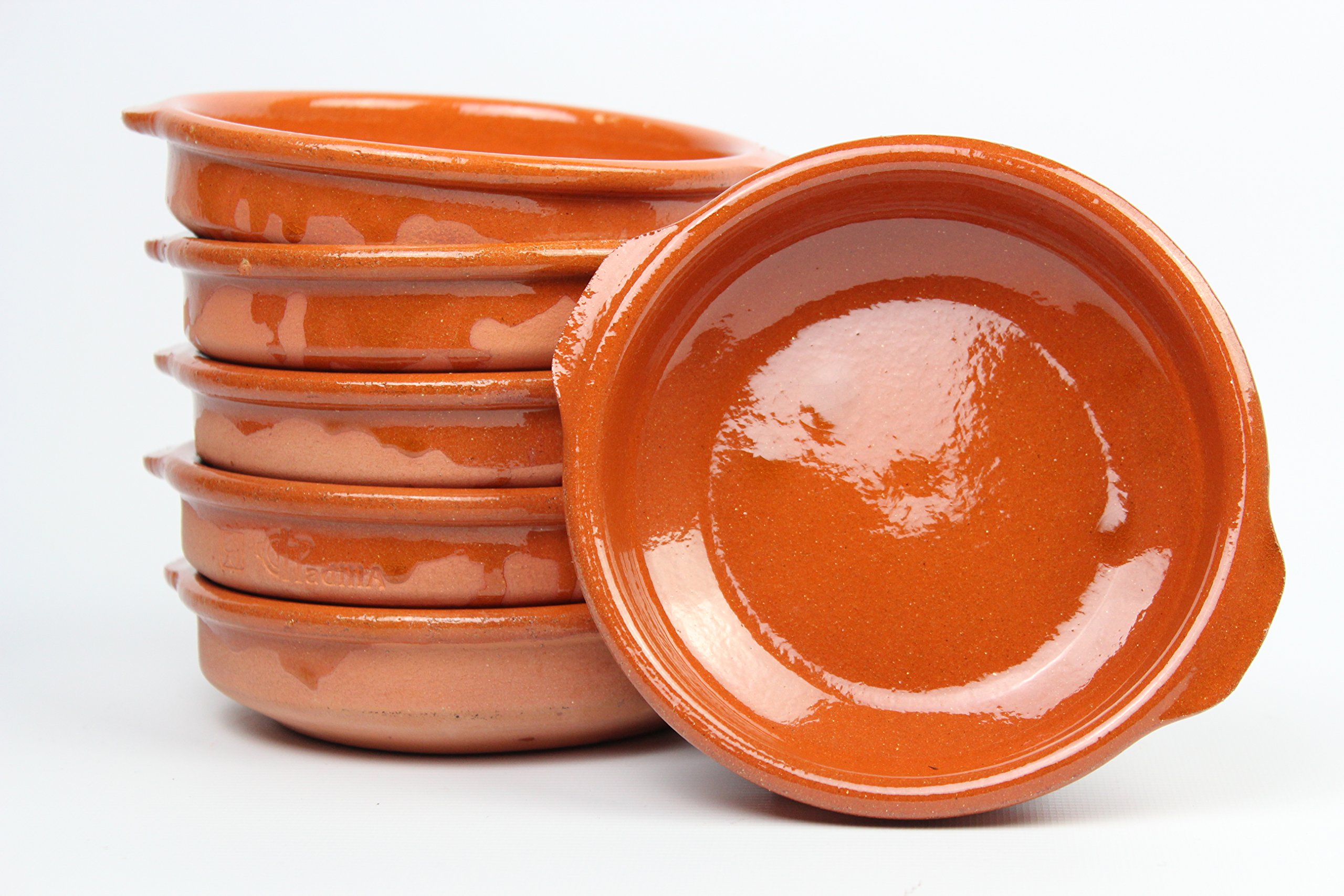 Terrine di terrcotta con Manici Diametro Esterno di 14 cm x 3,50 cm di altezza. Set di 6 pentole. realizzate in Spagna. In Terracotta refrattaria. n.8, misure interne: 12,5 cm.