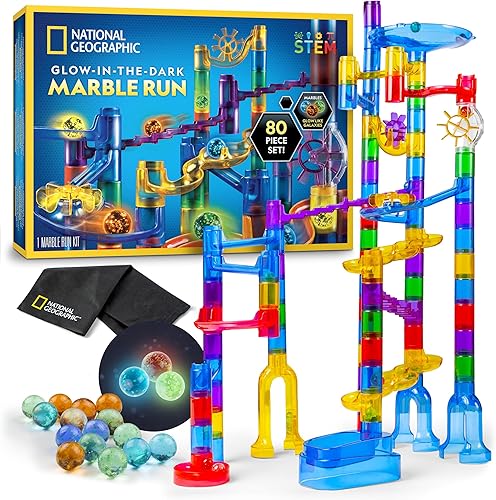 NATIONAL GEOGRAPHIC Glowing Marble Run - Juego de construcción con 15 canicas de vidrio que brillan en la oscuridad y bolsa de almacenamiento,