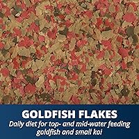 Vista 13 de Tetra Goldfish Flakes, dieta nutricionalmente equilibrada para peces de acuario, copos enriquecidos con vitamina C, 4.52 libras