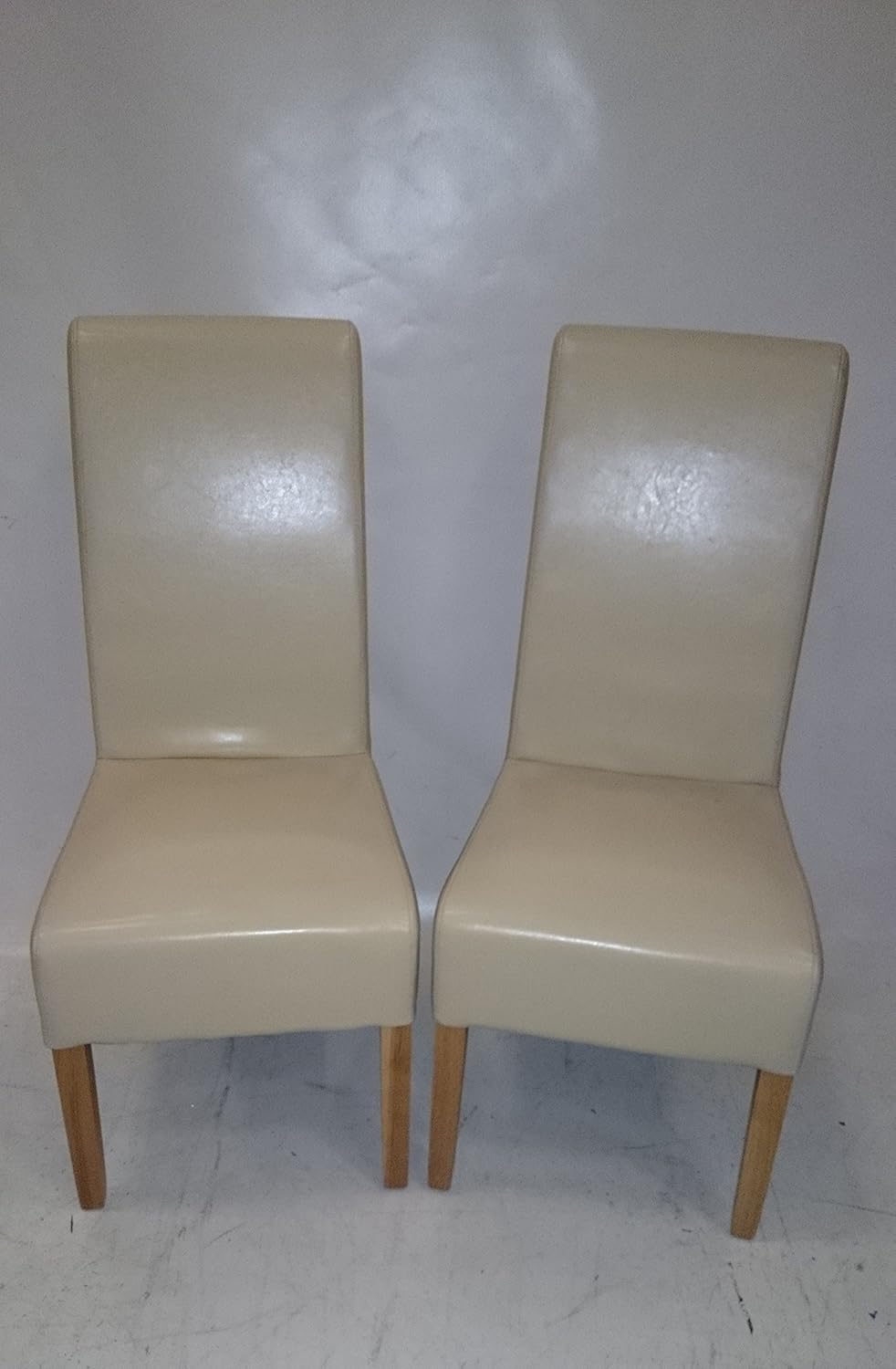2 SCROLL BACK IVORY LEATHER EXDISPLAY DINING CHAIRS WITH SOLID OAK