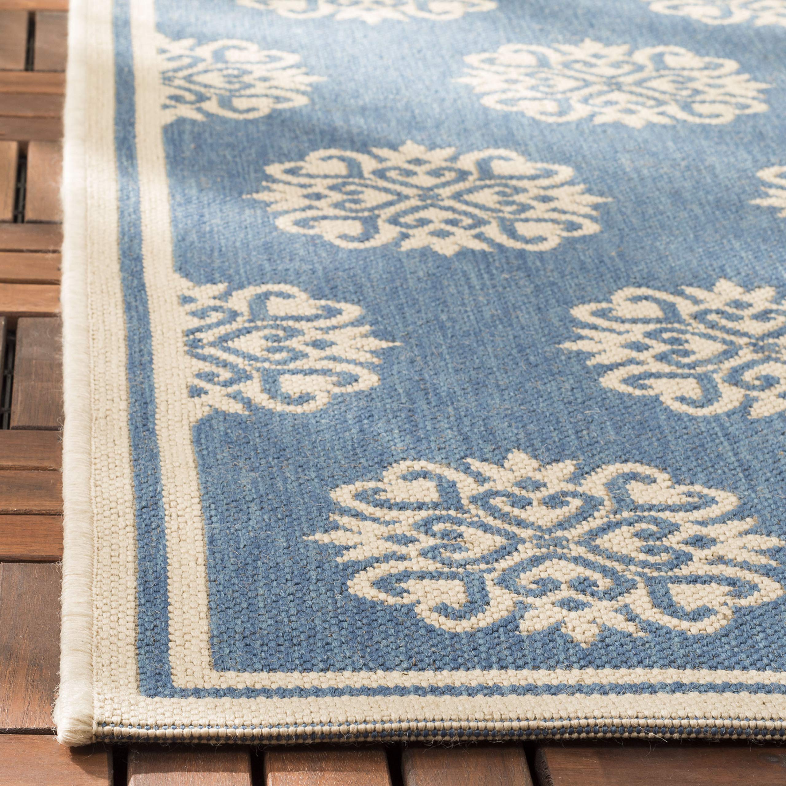 SAFAVIEH Tapis Traditionnel Pour Salon, Salle à manger, Chambre à coucher - Beachhouse Collection, Tapis à poil court, Crème et Bleu, 122 X 183 cm
