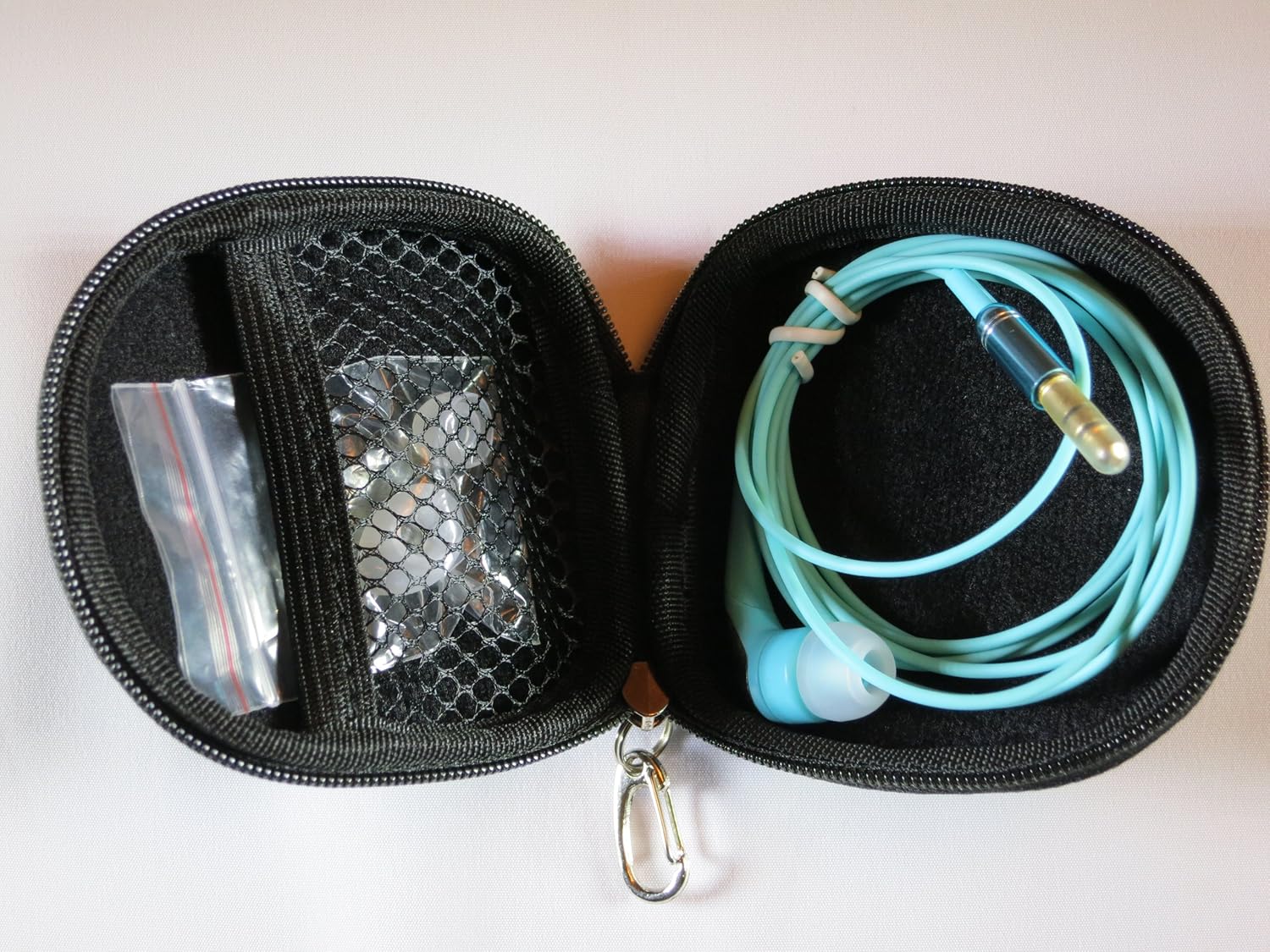 Turquoise Single-Ear Stereo Earphone with Zippered case and 3 Sizes of eartips