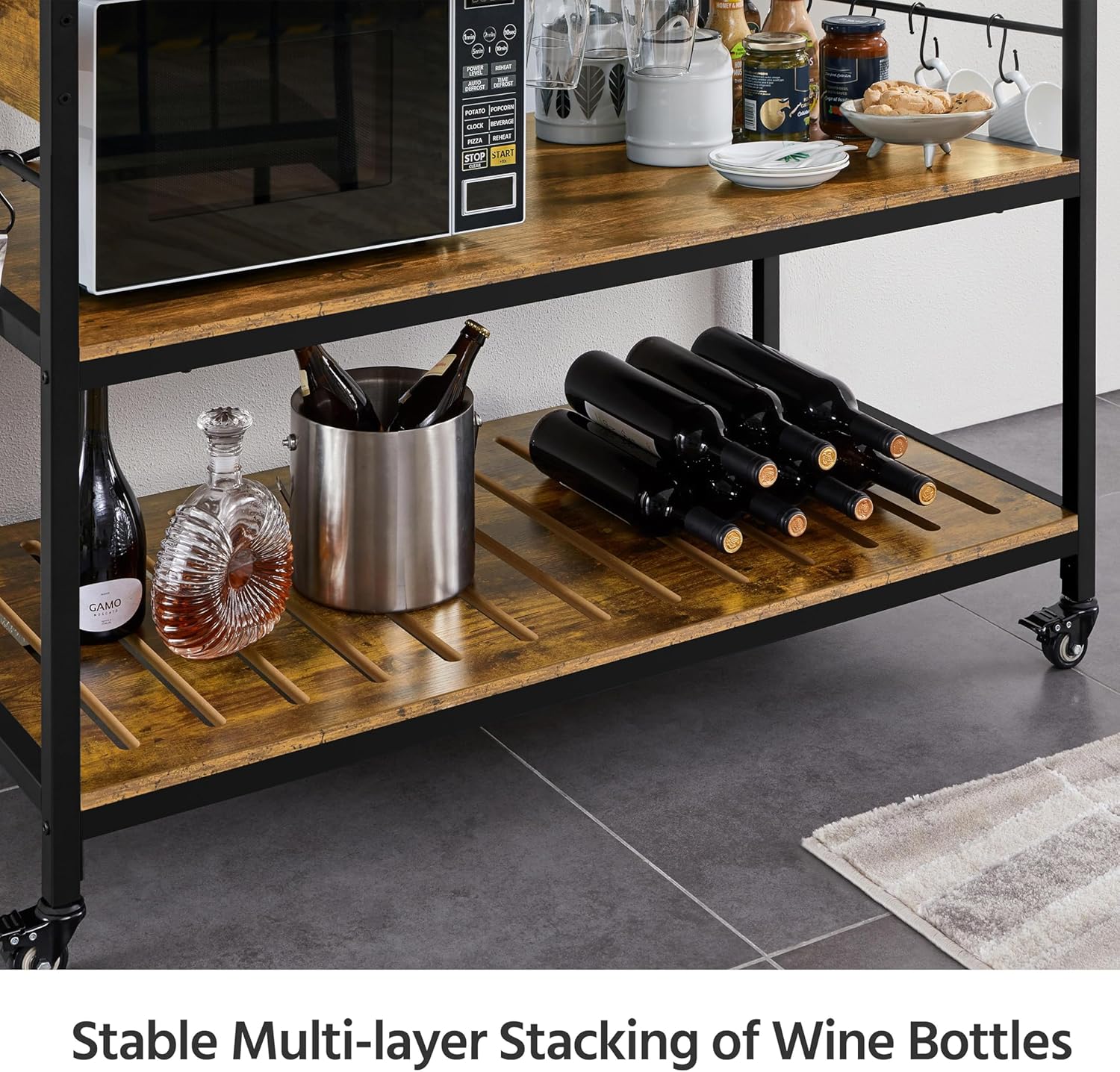 Close-up of wine bottle storage on the bottom shelf