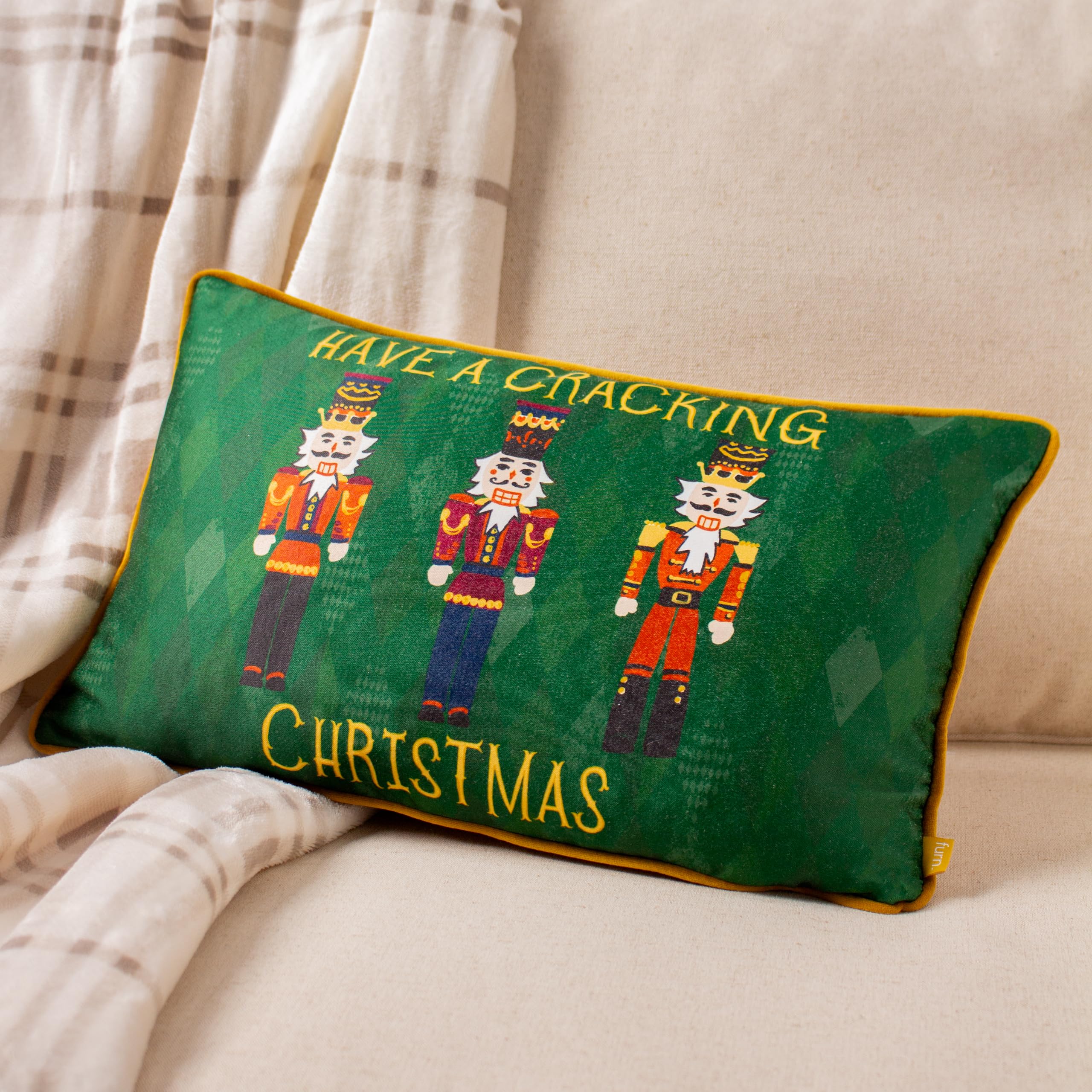 Furn. Nutcracker Cracking Christmas Printed Piped Velvet Feather Rich Cushion from B&Q