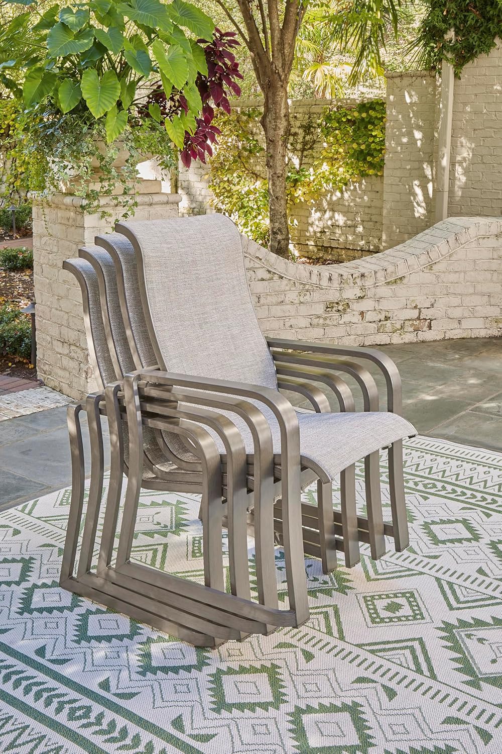 Signature Design by Ashley Beach Front Casual Outdoor Stackable Faux Leather Sling Arm Chair, Set of 4, Light Brown