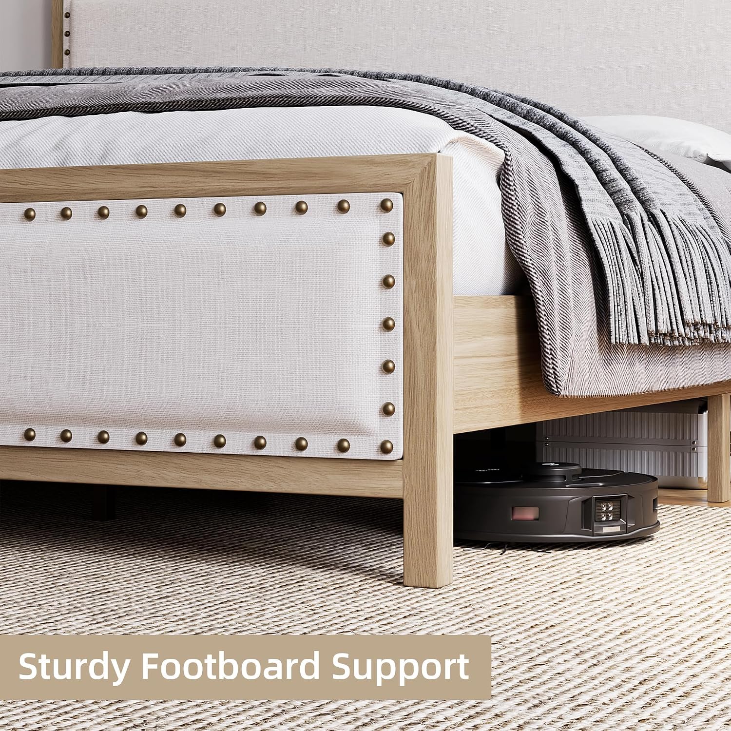 Image showing the sturdy footboard support of the bed frame with a robot vacuum underneath