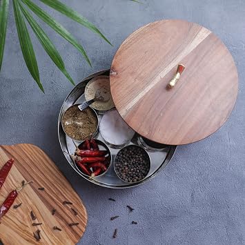 Desi Favors Round Stainless Steel Spice Box with Spoon, Indian Masala Dabba with 7 Compartments, Namak Daani with Spoon & Rustic Wooden Lid Spices, Kitchen Spices Container, 9x9x2.75 Inch Pack of 1