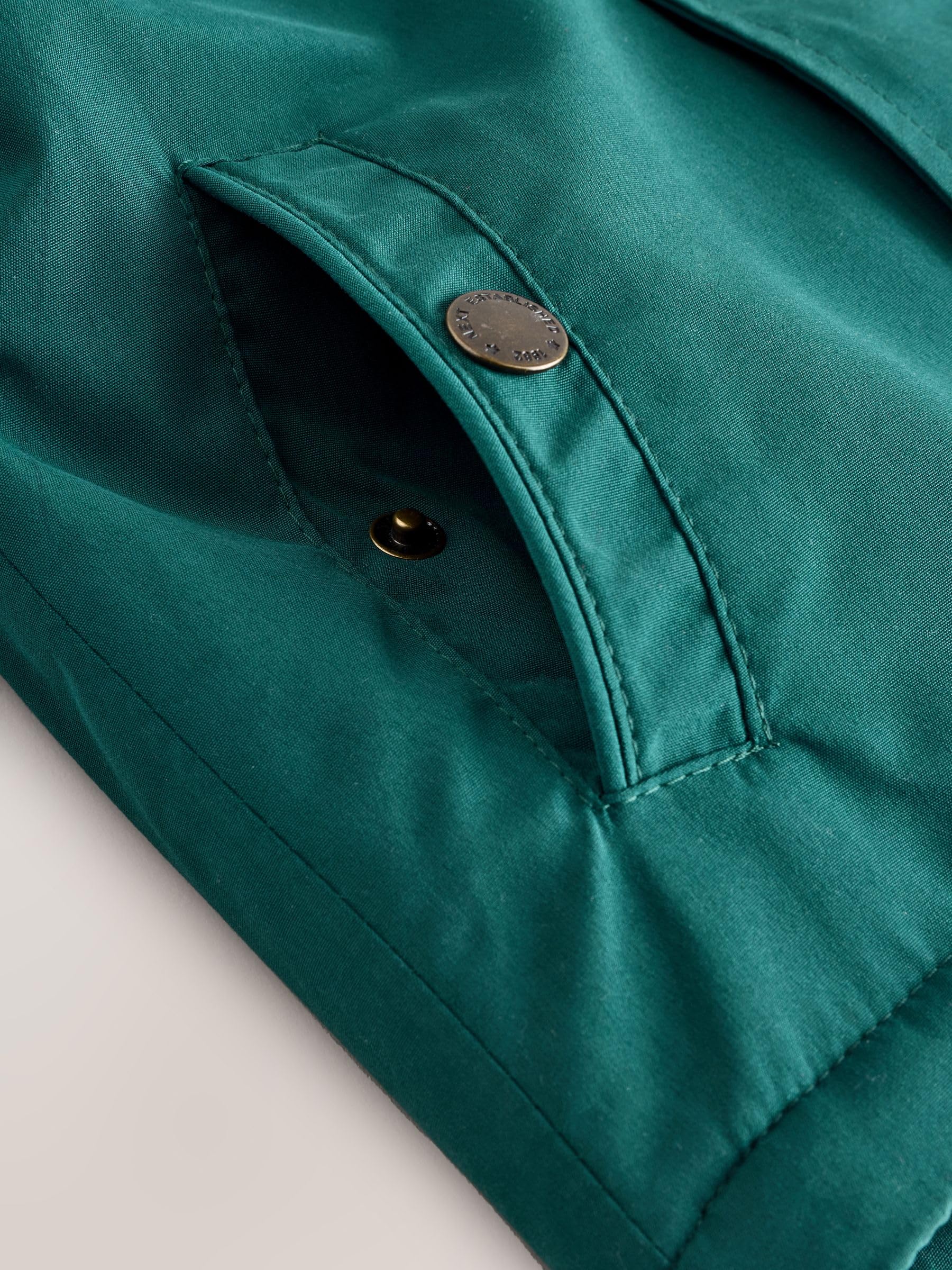 NEXT Garçon Parka imperméable avec doublure en peau lainée