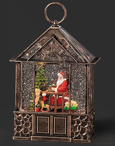 Roman Cenador de remolino iluminado de 11 pulgadas de alto con Santa pintando un tren de juguete Confetti Lites, decoración navideña