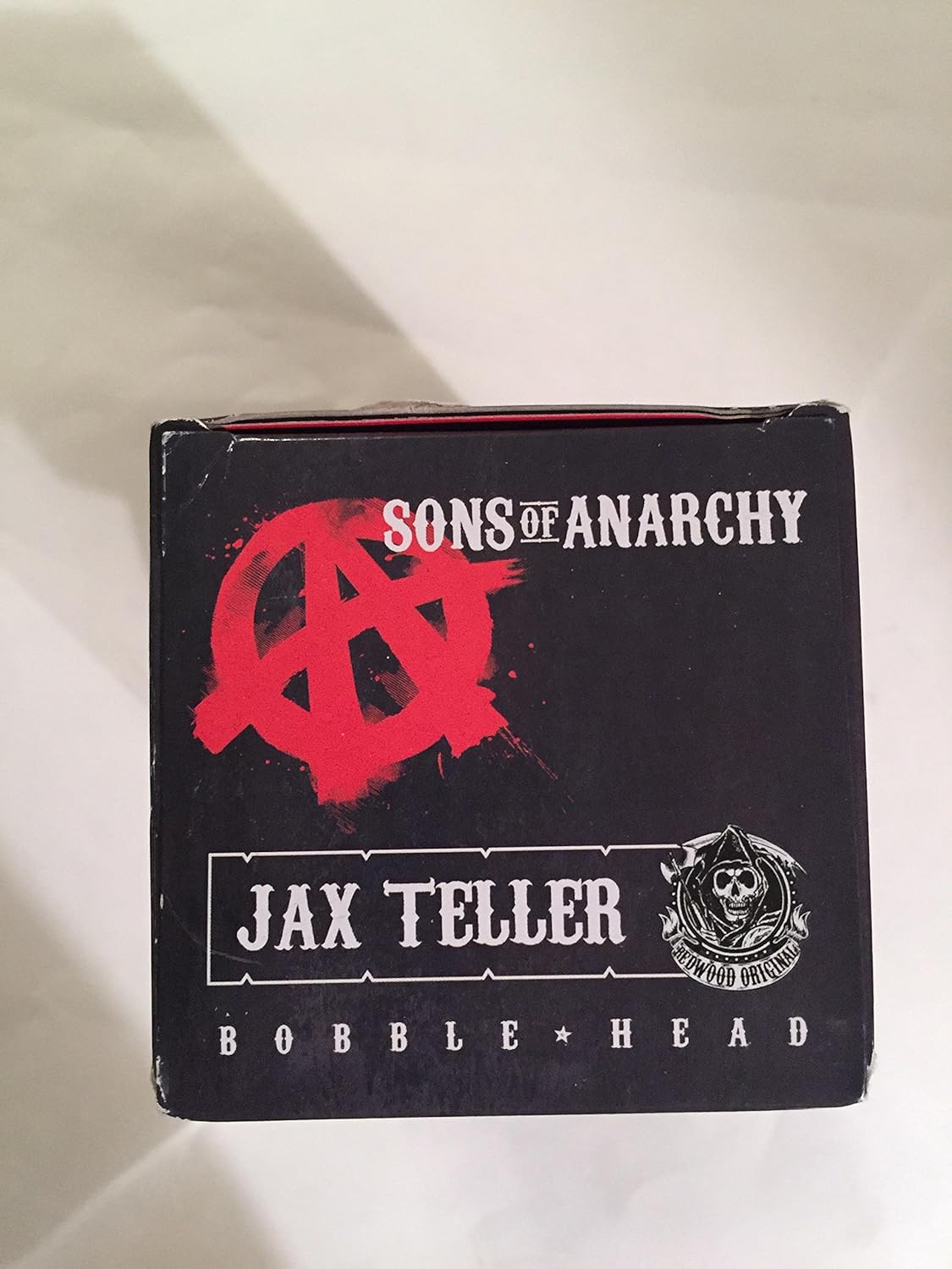 Топ view of the Sons Of Anarchy Jax Teller Wacky Wobbler Bobblehead packaging.