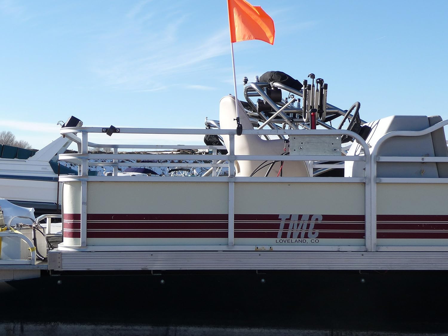 Pontoon Boat Flag Holder. Orange safety flag included. Tired of Holding the Skier Down Flag? Just clamp the Flag Buddy to your Boat and rotate it up when required. Rubbber clamping pads.