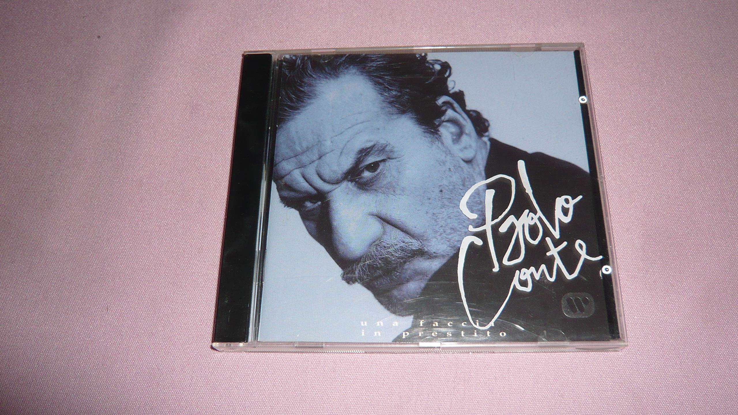Una Faccia in Prestito [Audio CD] Conte, Paolo
