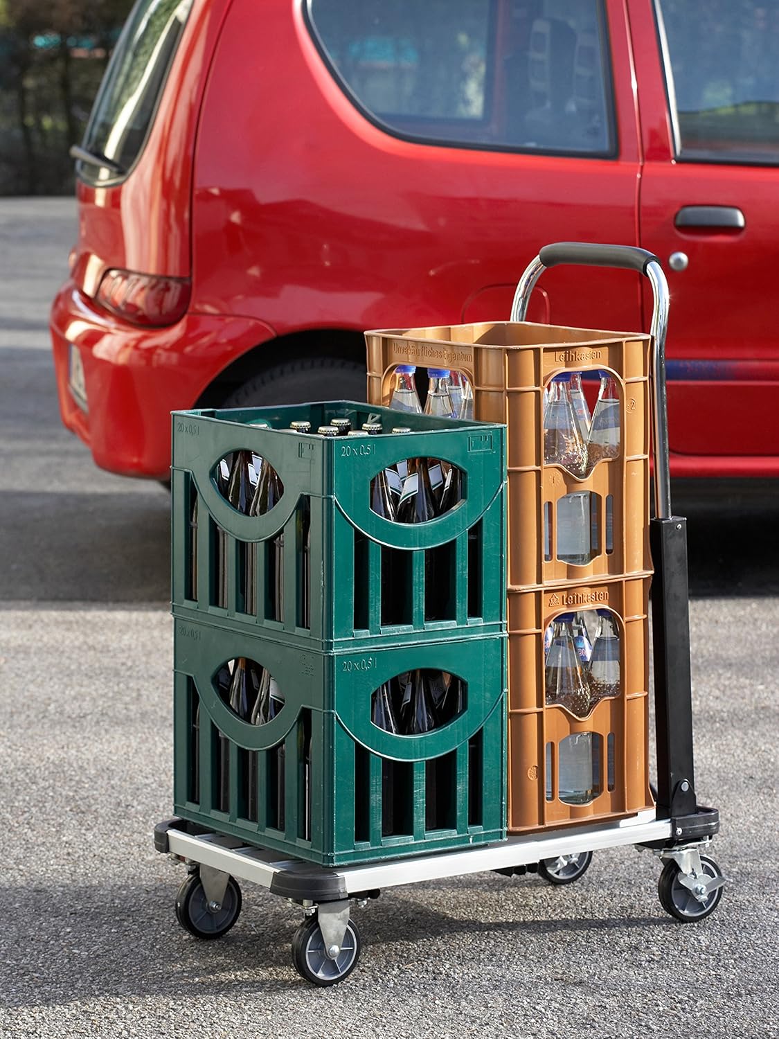 Transport truck carrying multiple crates of bottles.