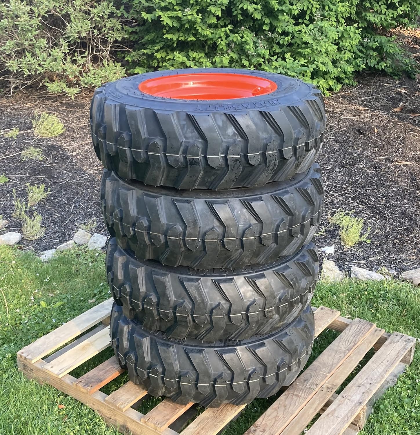 Set of 4-10-16.5 Forerunner SKS-1 Skid Steer Tires on Wheels/Rims (8 lug) for Bobcat 742, 743, 751, 753, 763, 773, 7753 & more - 12PLY -10X16.5