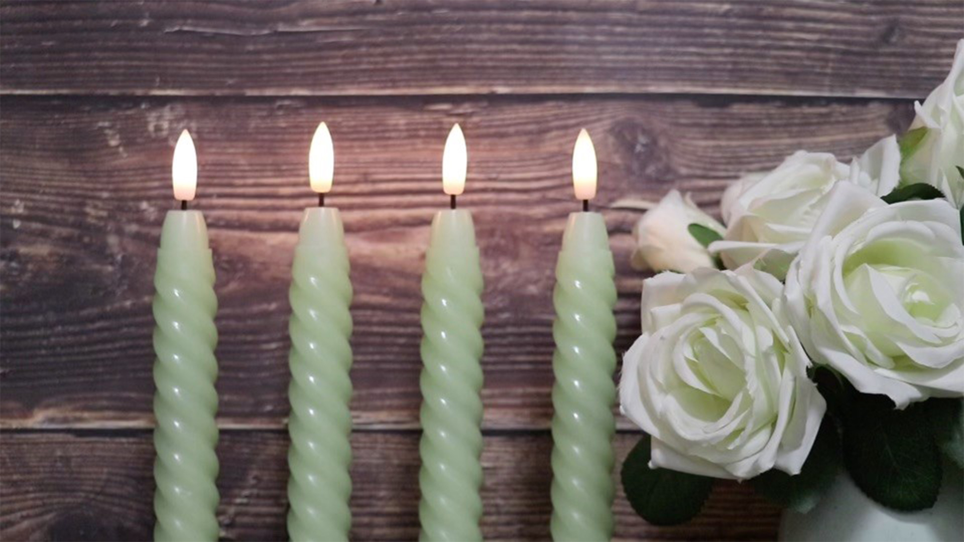 Image of Green Flameless Taper Candles Flickering with Remote Timer