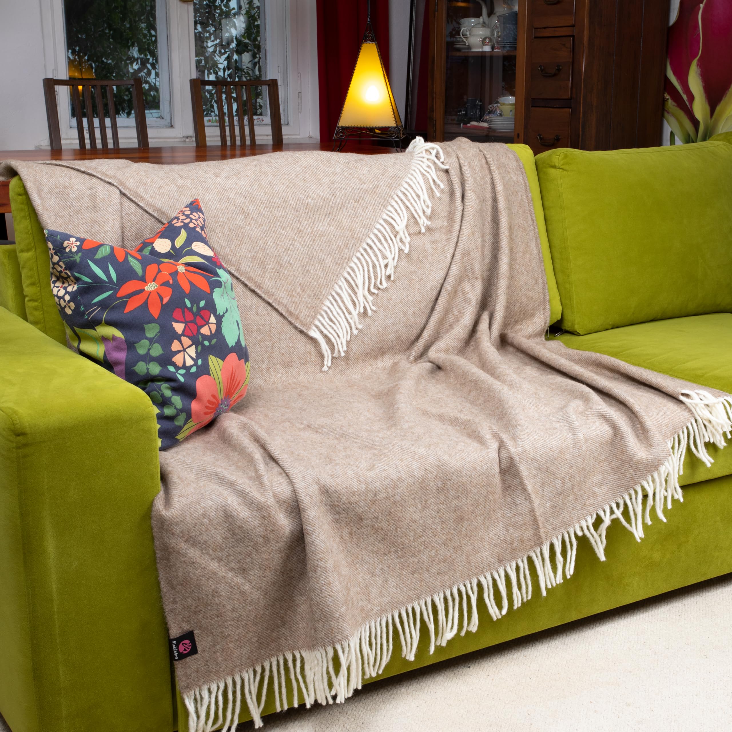 Couverture chaude mérinos pour vos soirées cocooning au salon sur le canapé