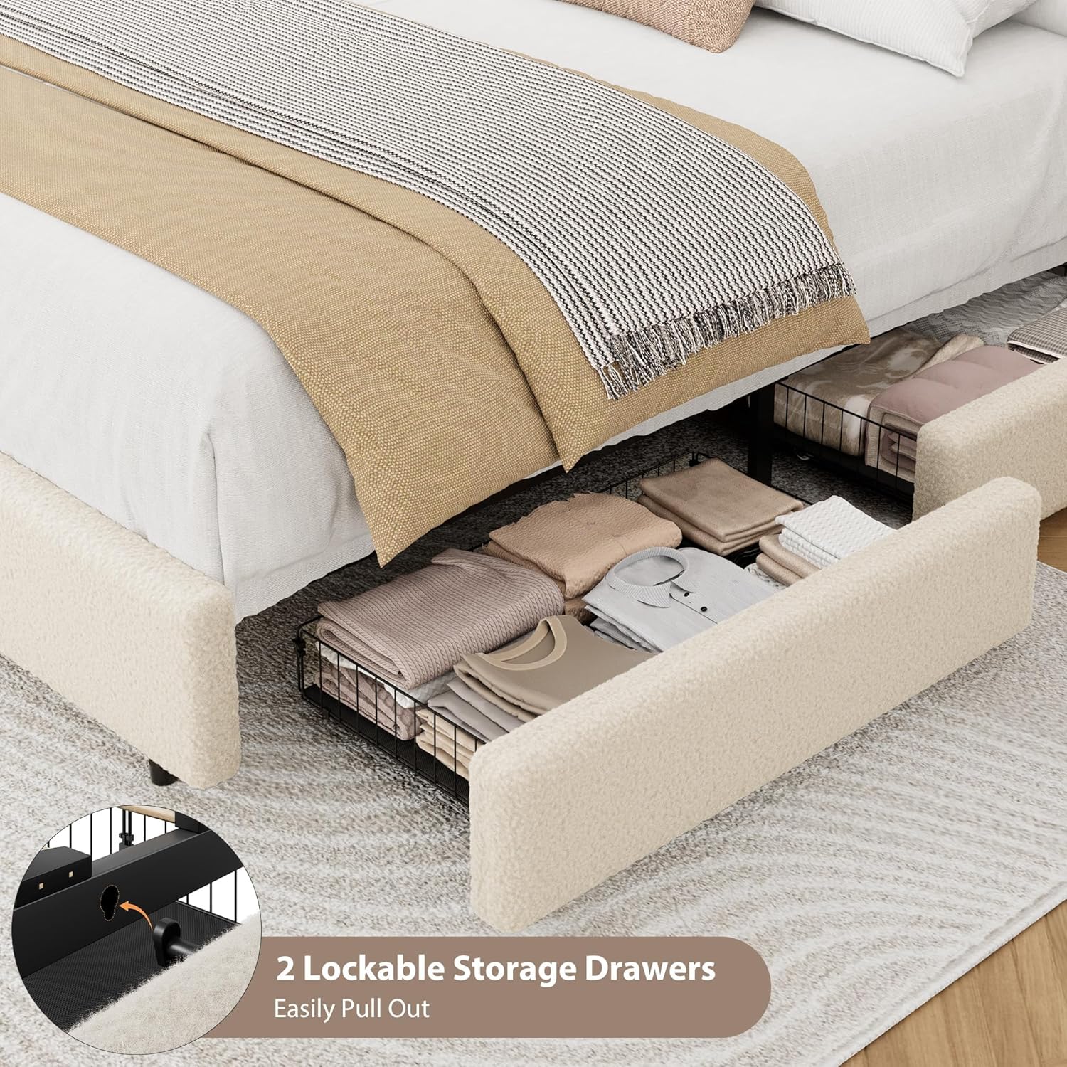 Two storage drawers pulled out from under the bed frame, filled with folded clothes