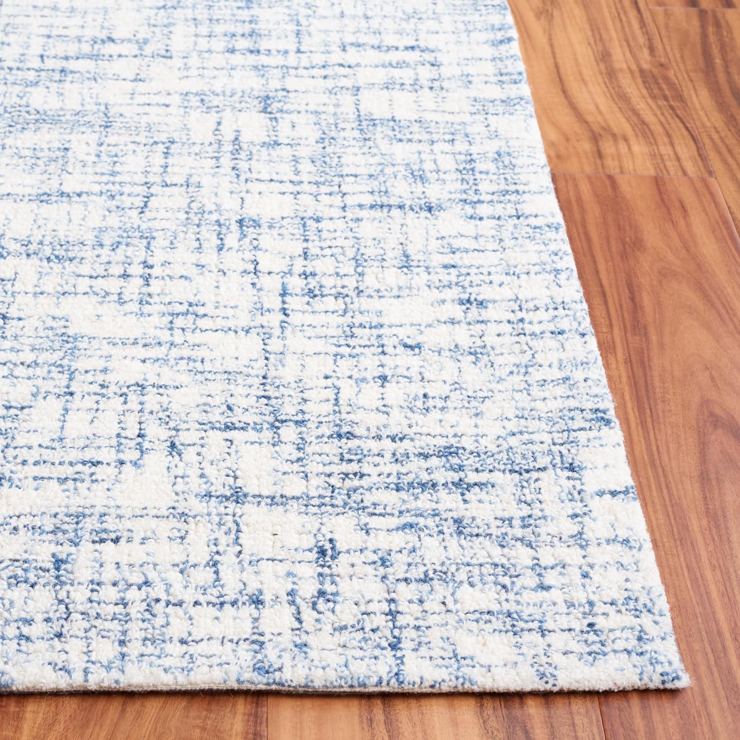 Ivory Tufted Handmade Wool Rectangular 6' x 9' Area Rug