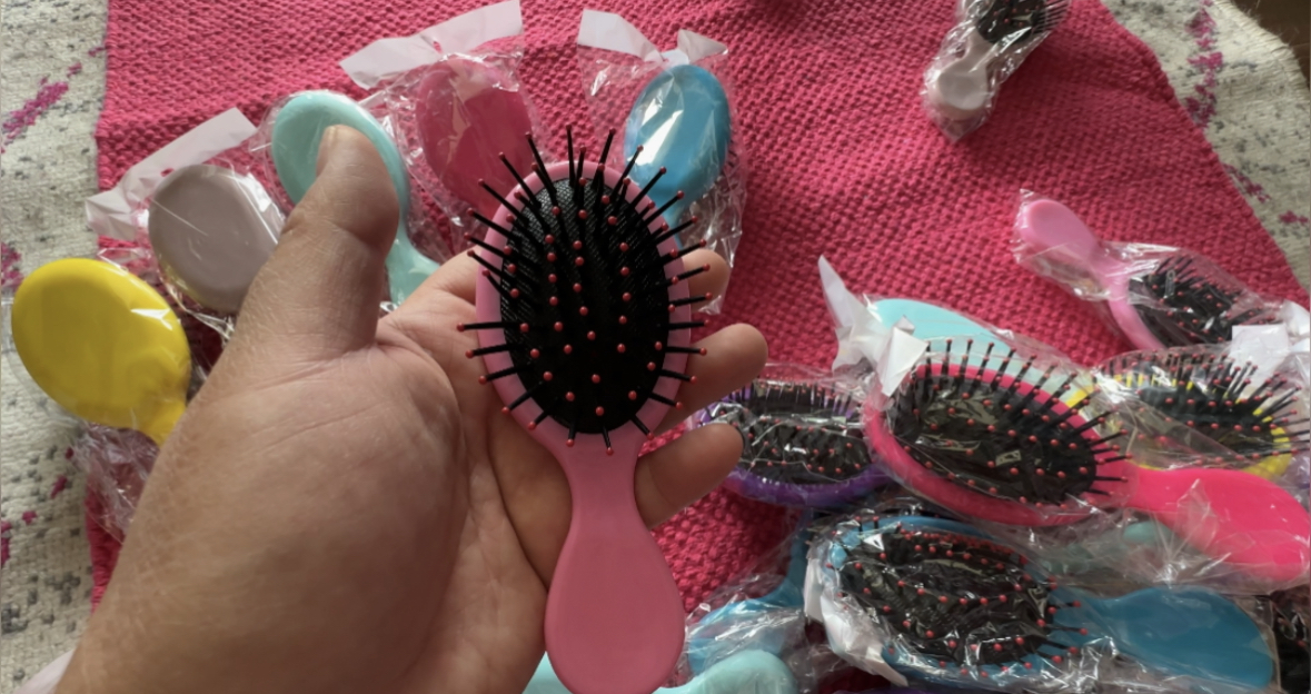Set of 24 detangling hairbrushes good size for lil kids on Amazon Live