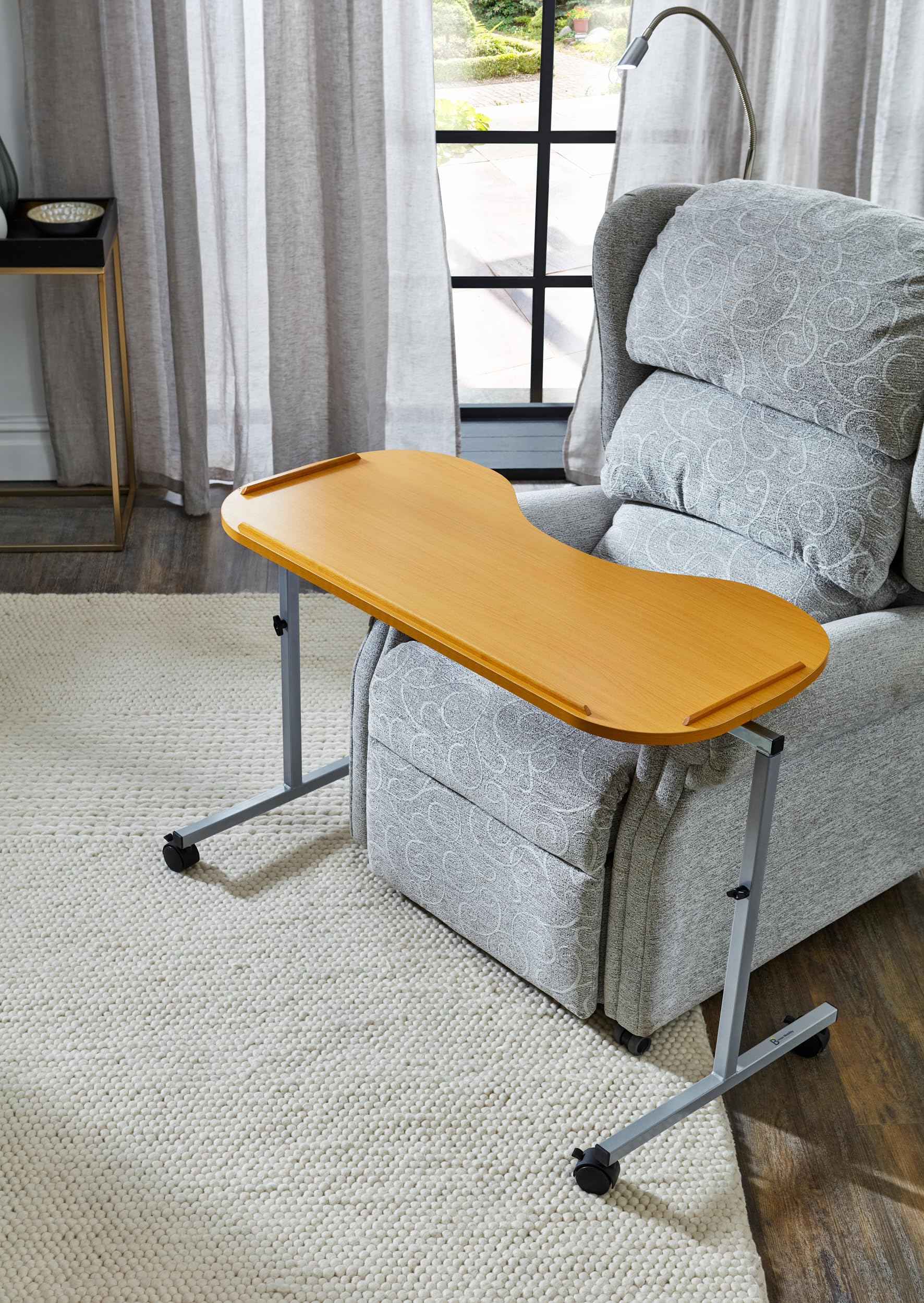 Mesa curvada sobre la cama y la silla, altura y anchura ajustables con ruedas con cerradura