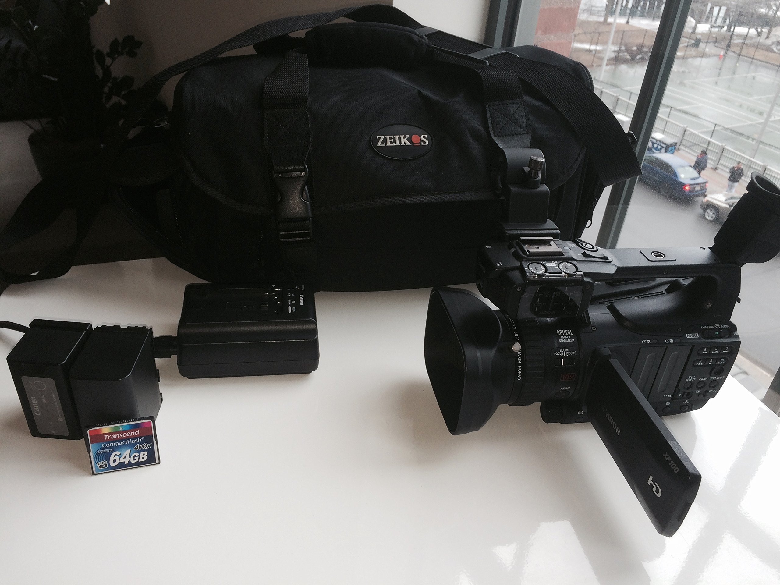 Canon XF100 Professional Camcorder with 10x HD Video Lens, Compact Flash (CF) Recording with Canon Battery Pack BP-955