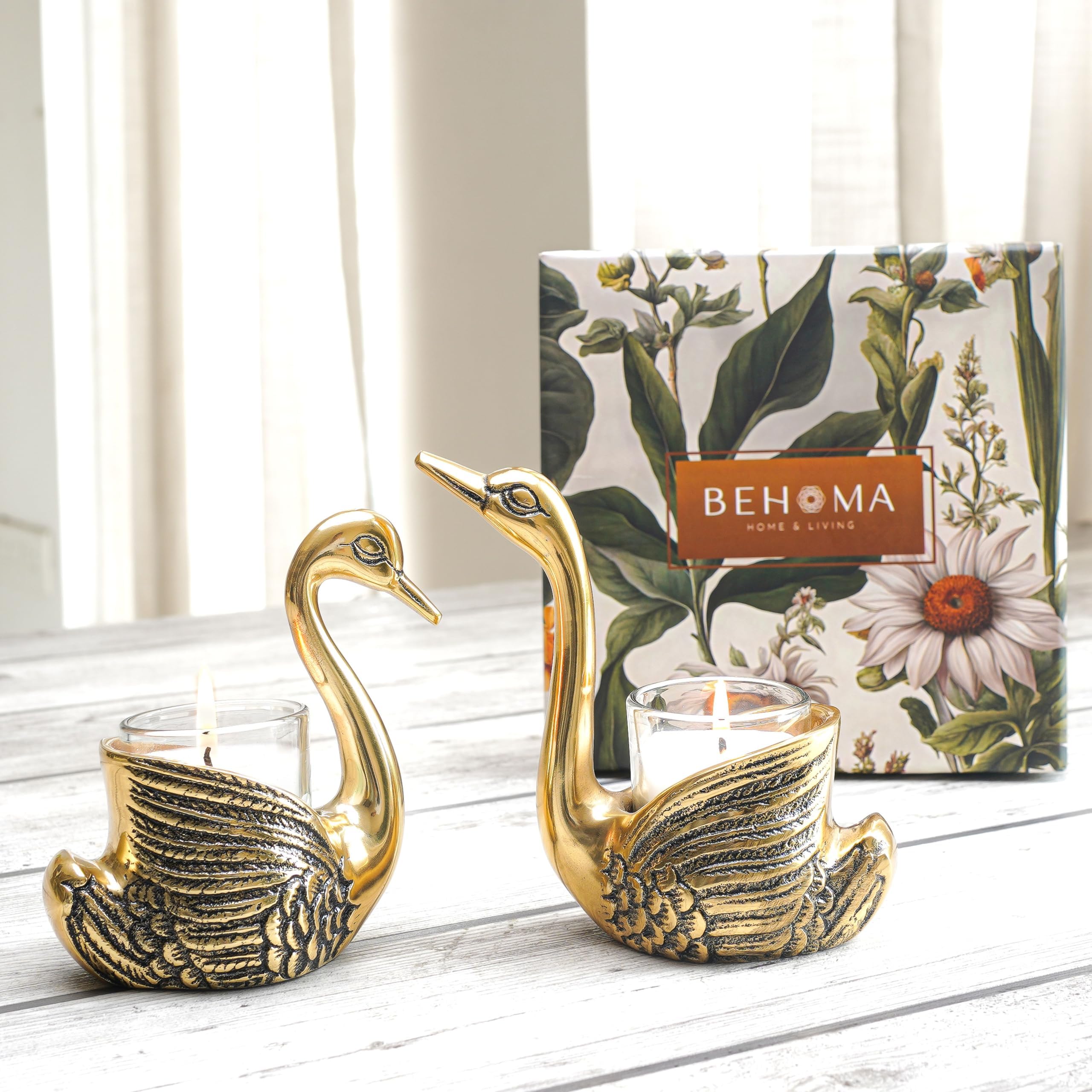 - BEHOMA Metal Pair of Swan Candle Holder & Candles Combo Gift Hamper, Festive Gifting Showpiece for Valentine's Day, Anniversary (2 Metal Swans, 2 Votive Glass Scented Candles,1 Premium Gift Box), Gold