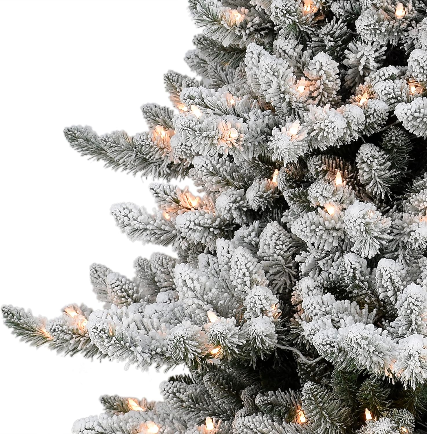 Close-up of flocked branches and clear lights on the Puleo International Christmas tree.