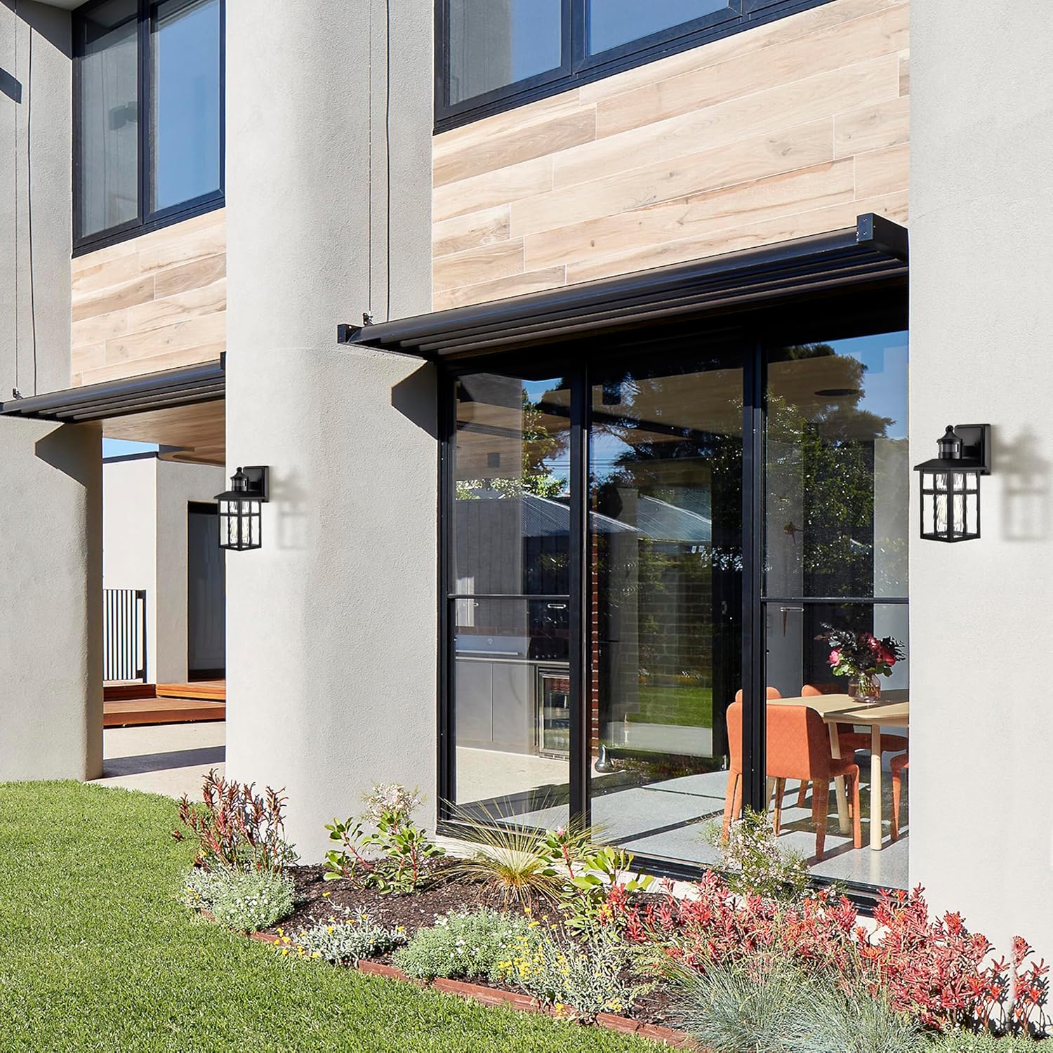 Close-up of the motion sensor on the Edvivi outdoor wall sconce with icons for ON, OFF, and motion sensor.