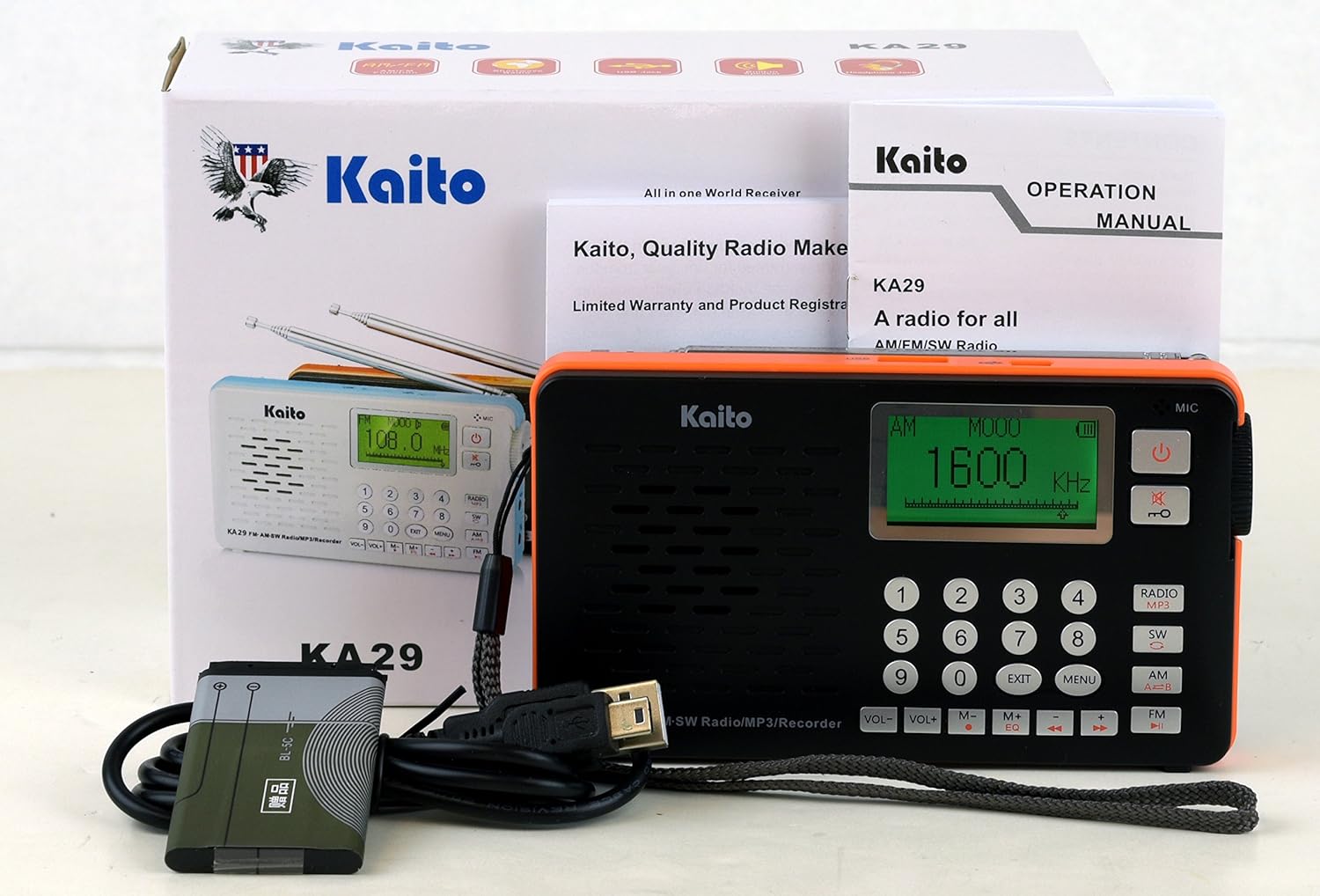 Kaito KA29 packaging and included accessories: radio, manual, battery, USB cable
