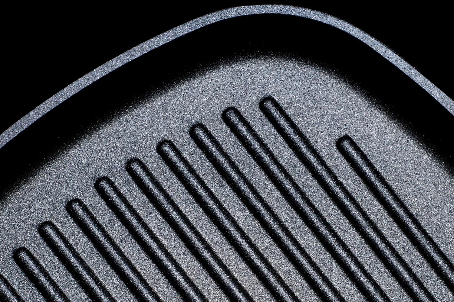 Woll Diamond Lite pan and its removable handle stored in a kitchen drawer