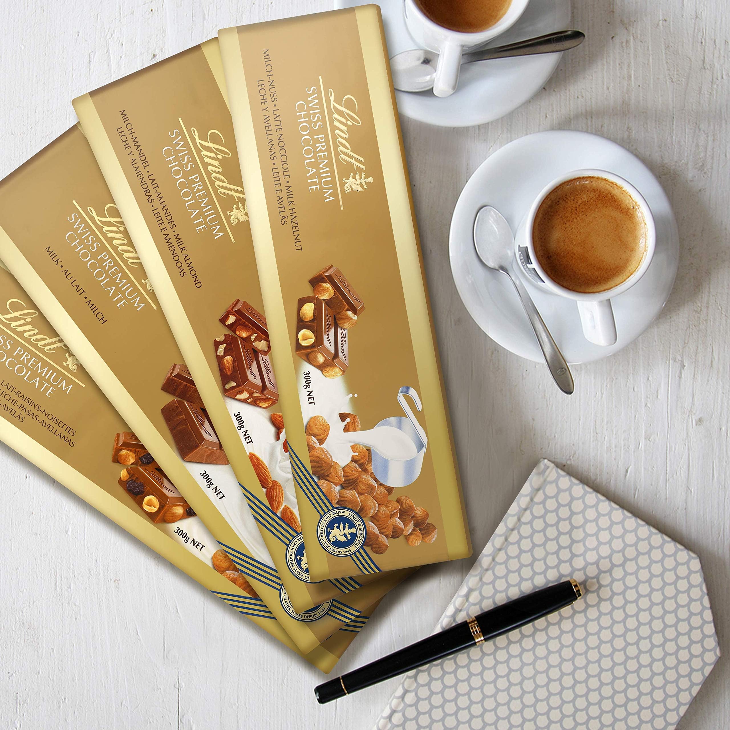Lindt Tableta de Chocolate con leche con Almendras Gama Oro, cremoso y suave, chocolate suizo tradicional, 300gr (Paquete de 4)