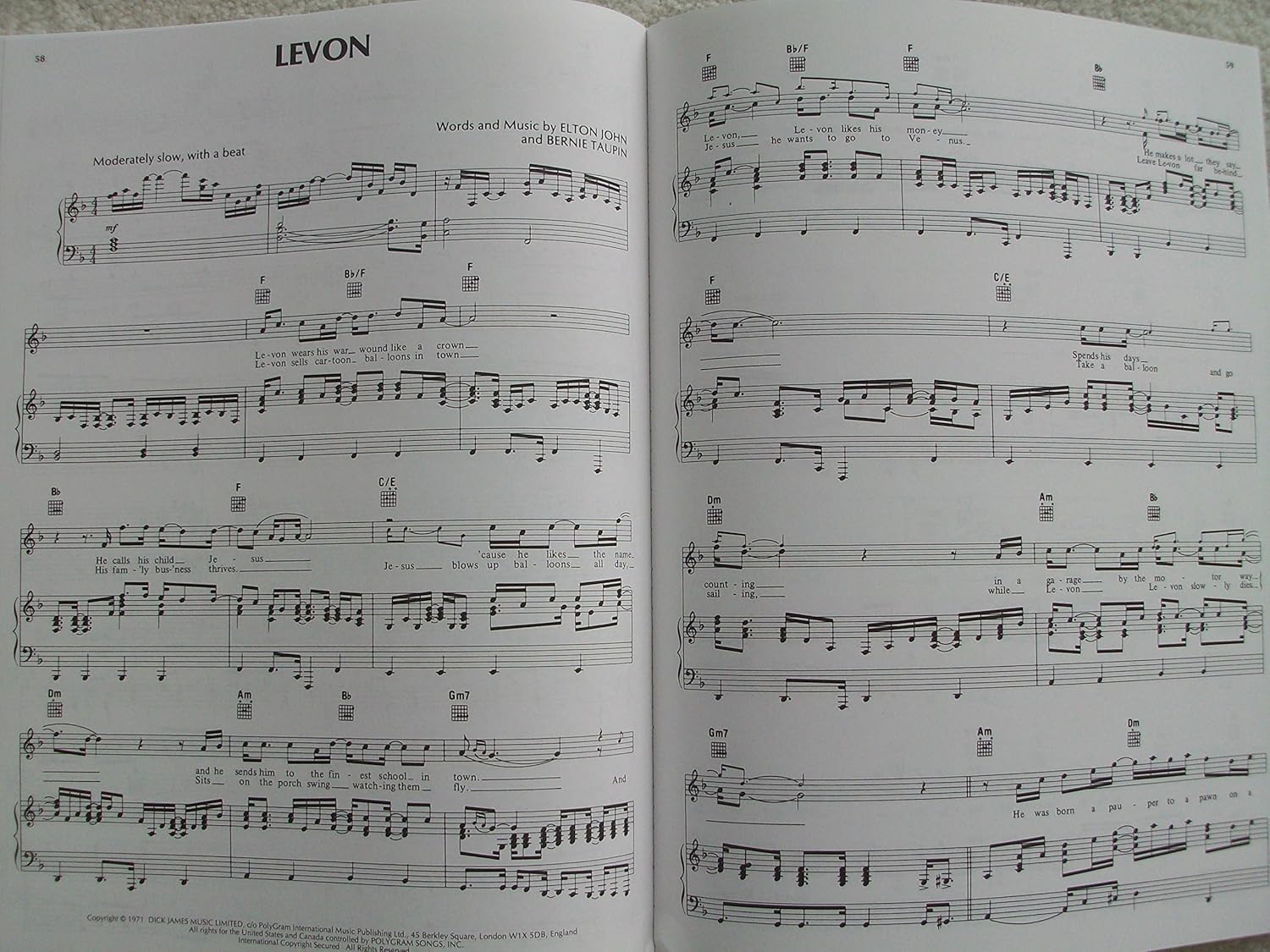 Elton John. Greatest Hits (Updated). For Voice, Piano, & Guitar      Sheet music