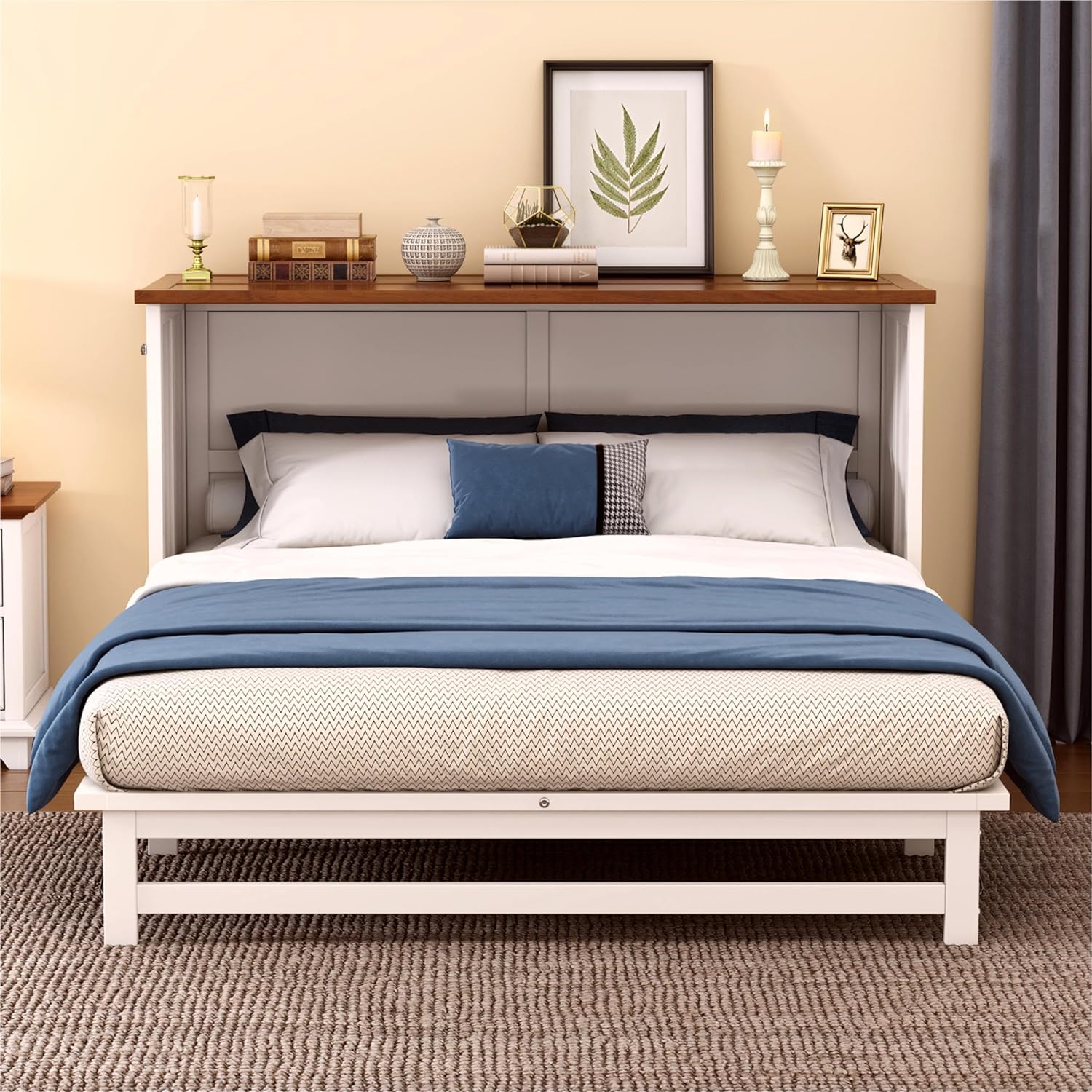 The Murphy bed in its open position, showing the bed frame extended from the cabinet