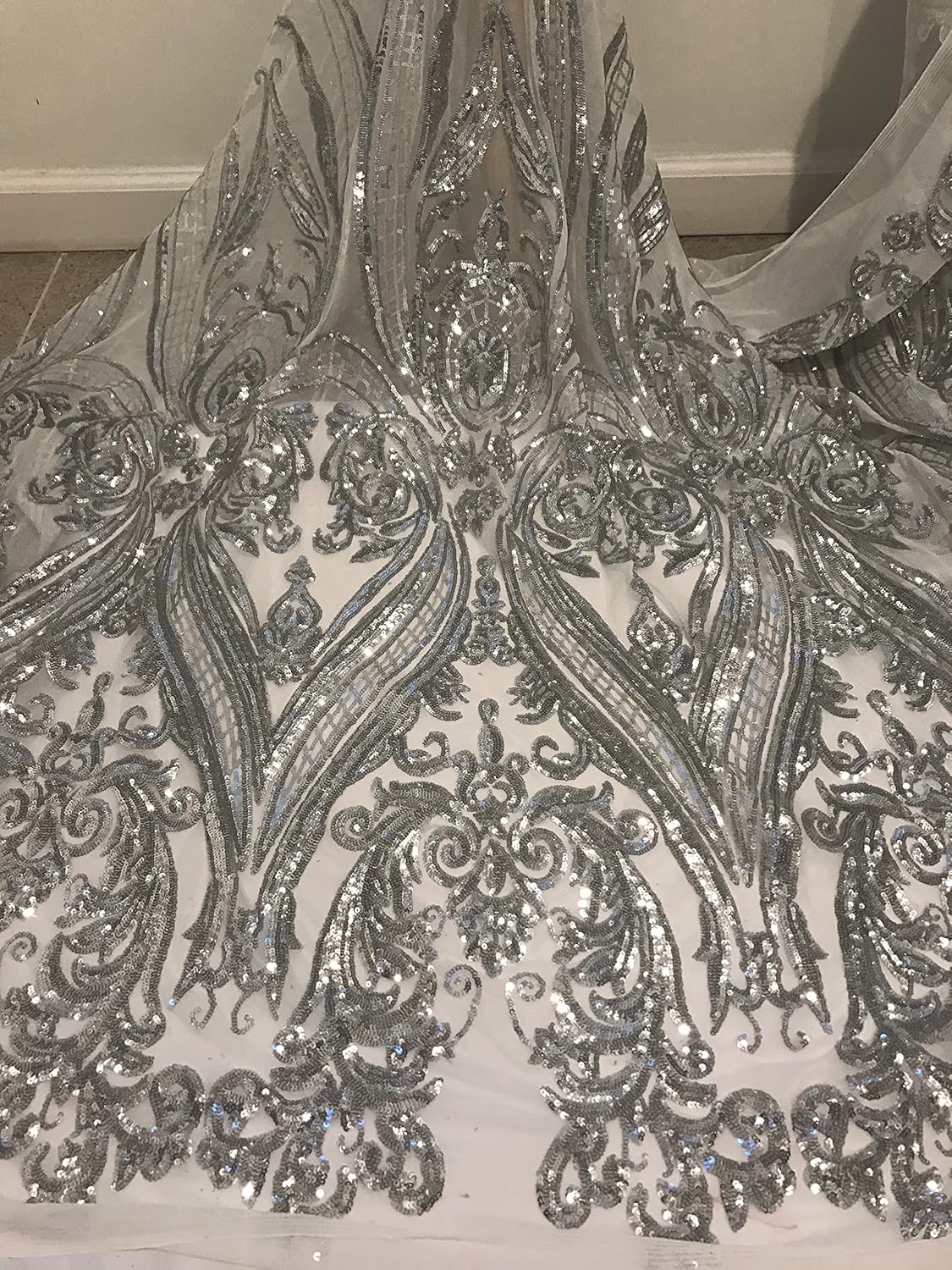4way stretch white l Mesh W/Silver sequins Lace fabric 50” Width Sold by The yard